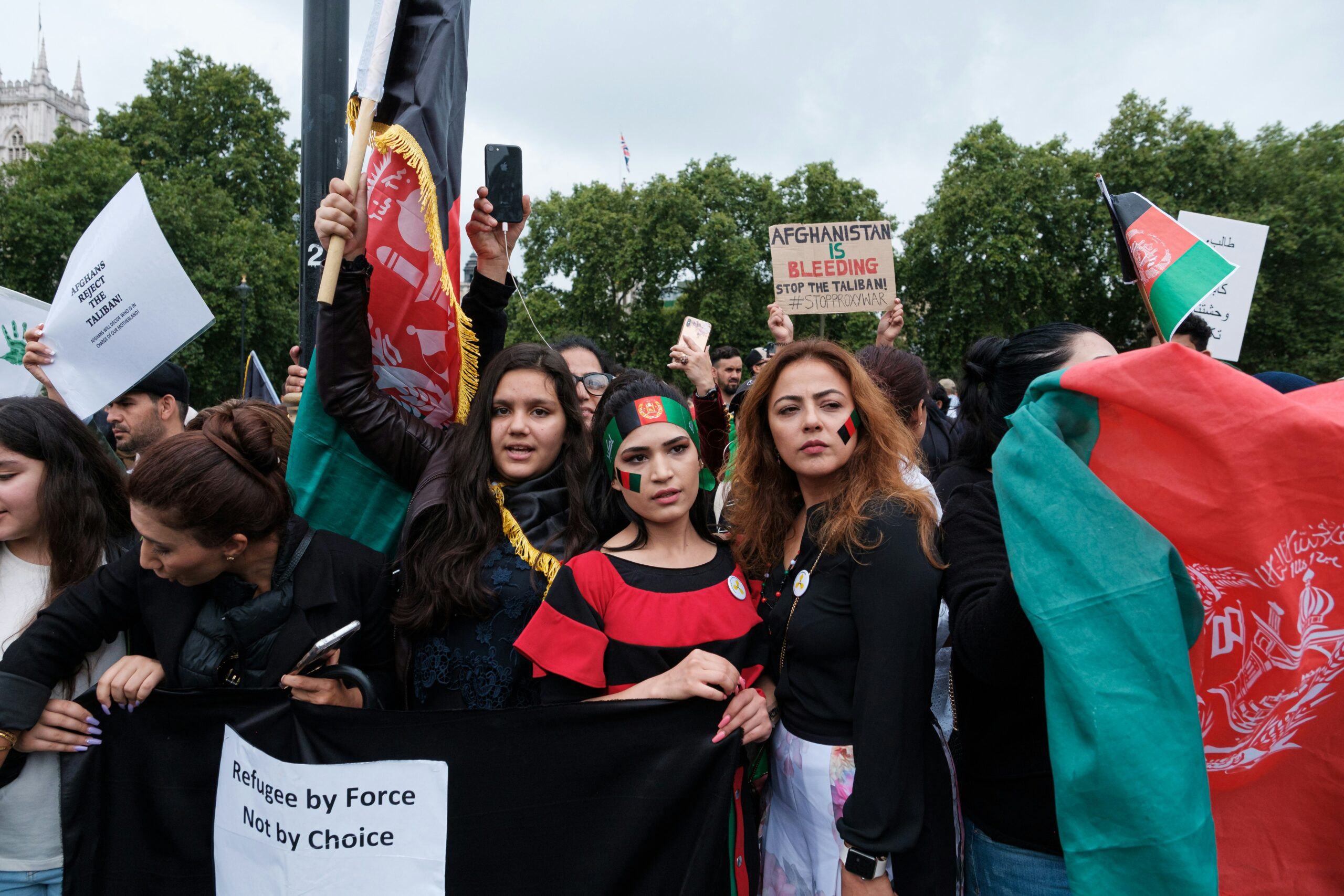 group of people holding banner