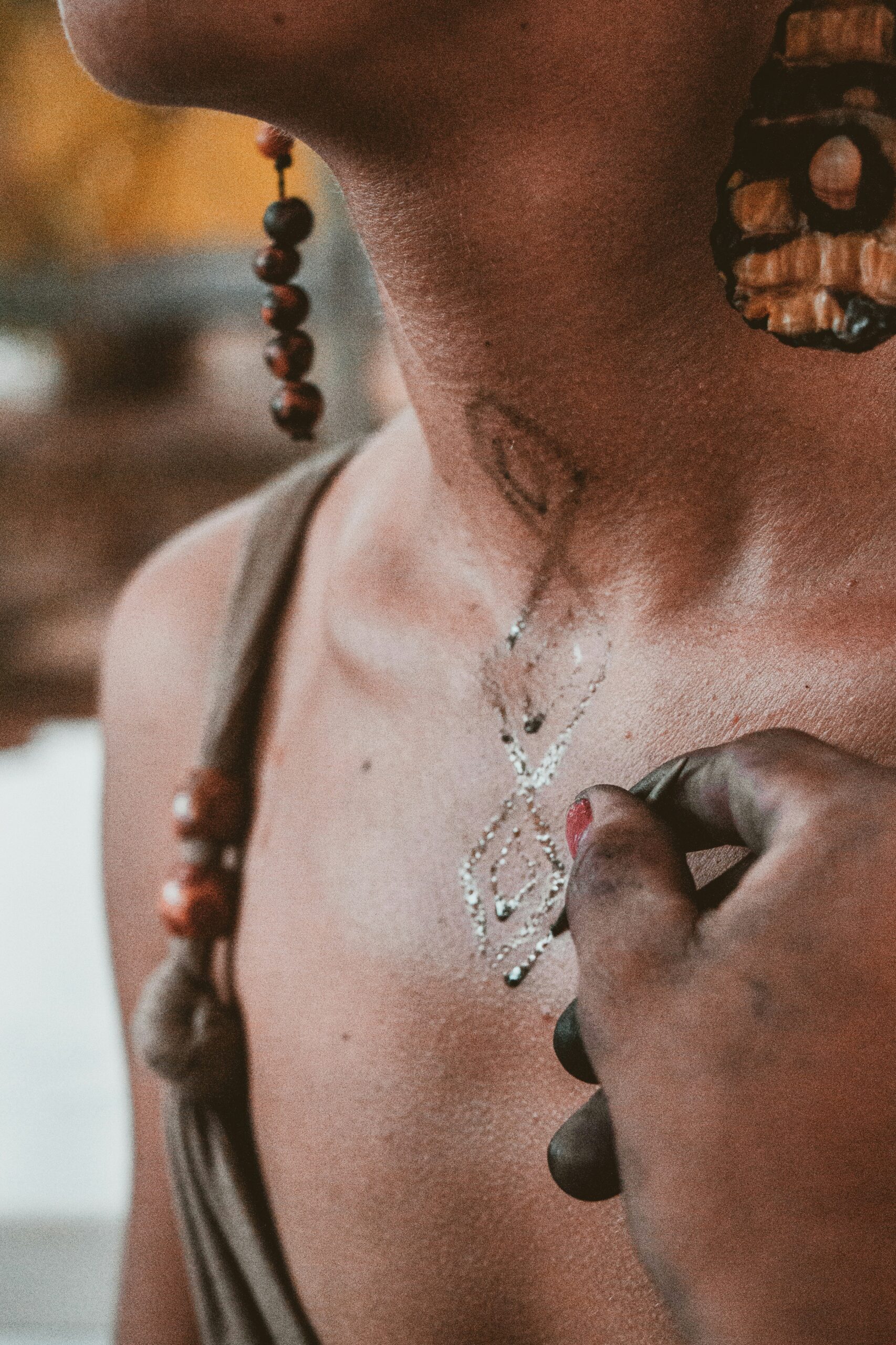 woman wearing silver and diamond studded necklace