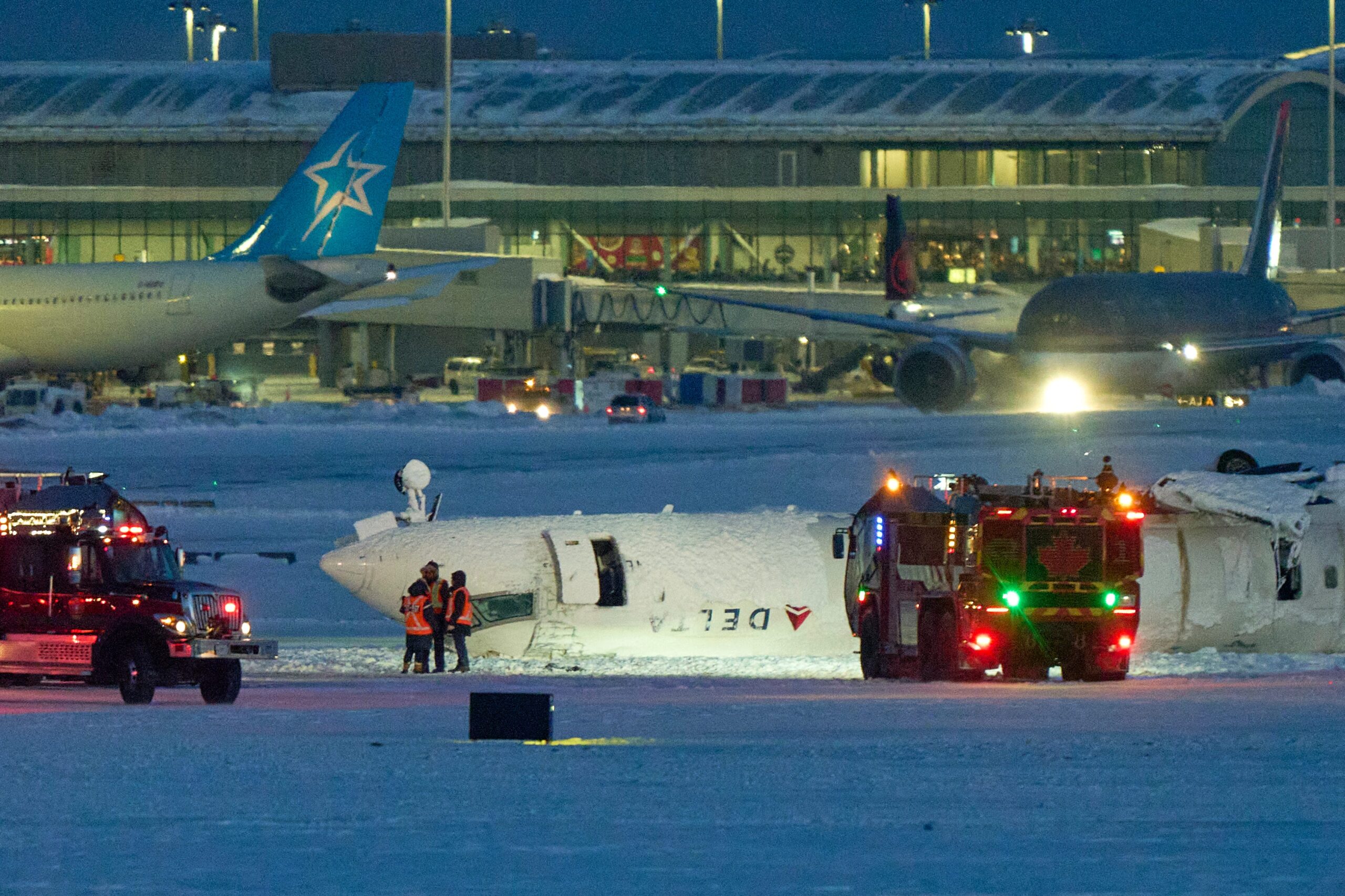 Delta Air Lines, Pearson Airport, Toronto, Crash, Landing, Injuries, Investigation, Federal Aviation Administration, CRJ-900, Minneapolis/St. Paul International Airport, Peel Regional Paramedic Services, Upside-down plane, Todd Aitken, Transportation Safety Board of Canada, National Transportation Safety Board, Secretary Sean Duffy