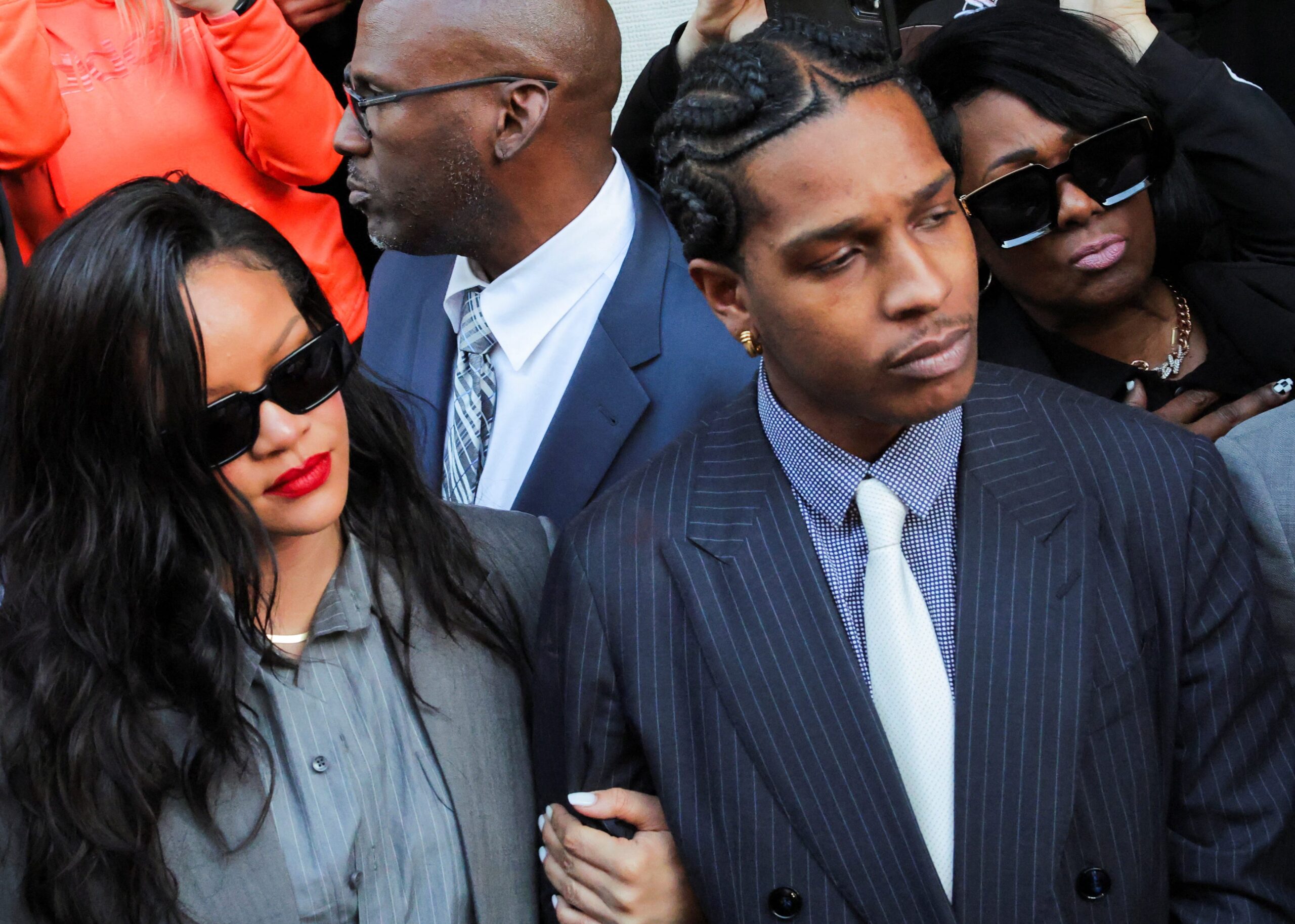 A$AP Rocky, A$AP Relli, Rihanna, Not Guilty, Shooting, Felony Assault, Semiautomatic Firearm, 24-Year Prison Sentence, Ruby Rosary, The Glory Belongs to God and God Alone, Los Angeles Courthouse, Nicki Minaj, Runnin, Ye, Jukebox Joints, Papoose, 50 Cent, Spike Lee, Highest 2 Lowest, Denzel Washington, 40 Acres and a Mule