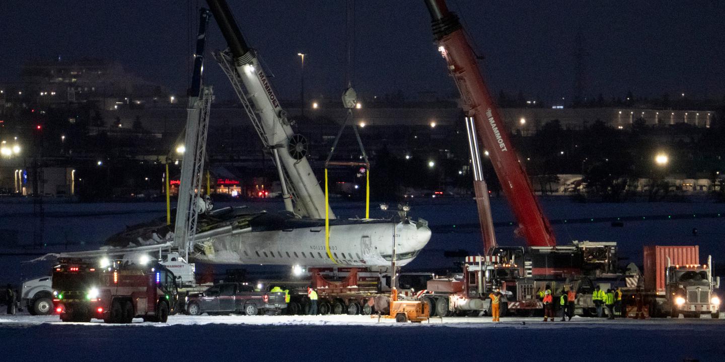 Toronto airport crash, Delta Air Lines, compensation, injured passengers, aviation safety, Bombardier CRJ900, North American aviation accidents