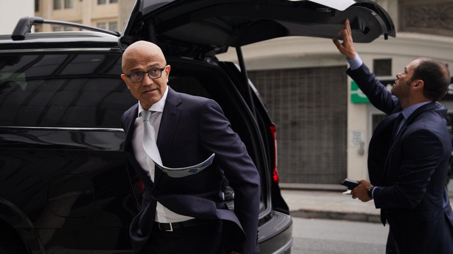 AI, Microsoft, Satya Nadella, OpenAI, Sam Altman, Industrial Revolution, GDP growth, Copilot, Klarna, test-time thinking, AI safety, dot-com boom, echo chamber