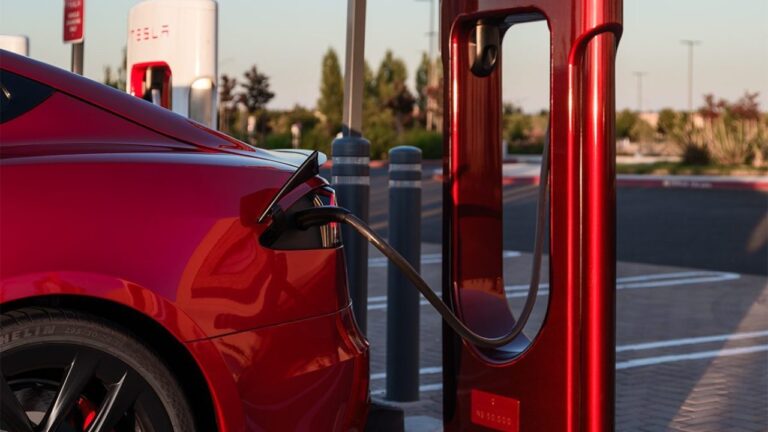 Tesla Supercharger, Tesla Virtual Queue System, Supercharger Line, Electric Vehicle Charging, Tesla App, Tesla Supercharger Expansion, Tesla Charging Network, Elon Musk