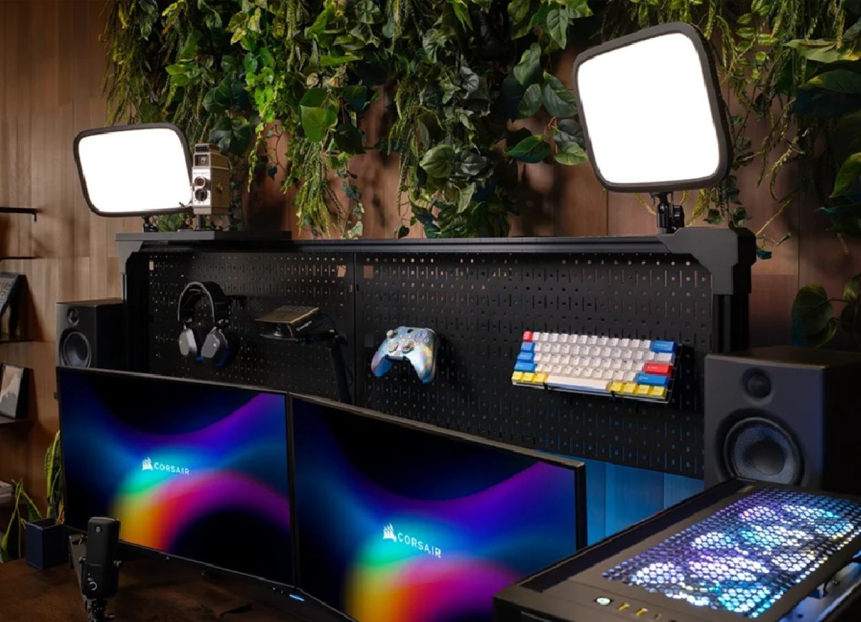 Standing desks, Corsair, Platform series, Adam, PCWorld, Cable management, Integrated chargers, Outlet strips, Monitor arms, Elevate-powered adjustable legs, Riser rail, VESA, Pegboard header, Side-mounted desktop extensions, Review, Pros, Cons