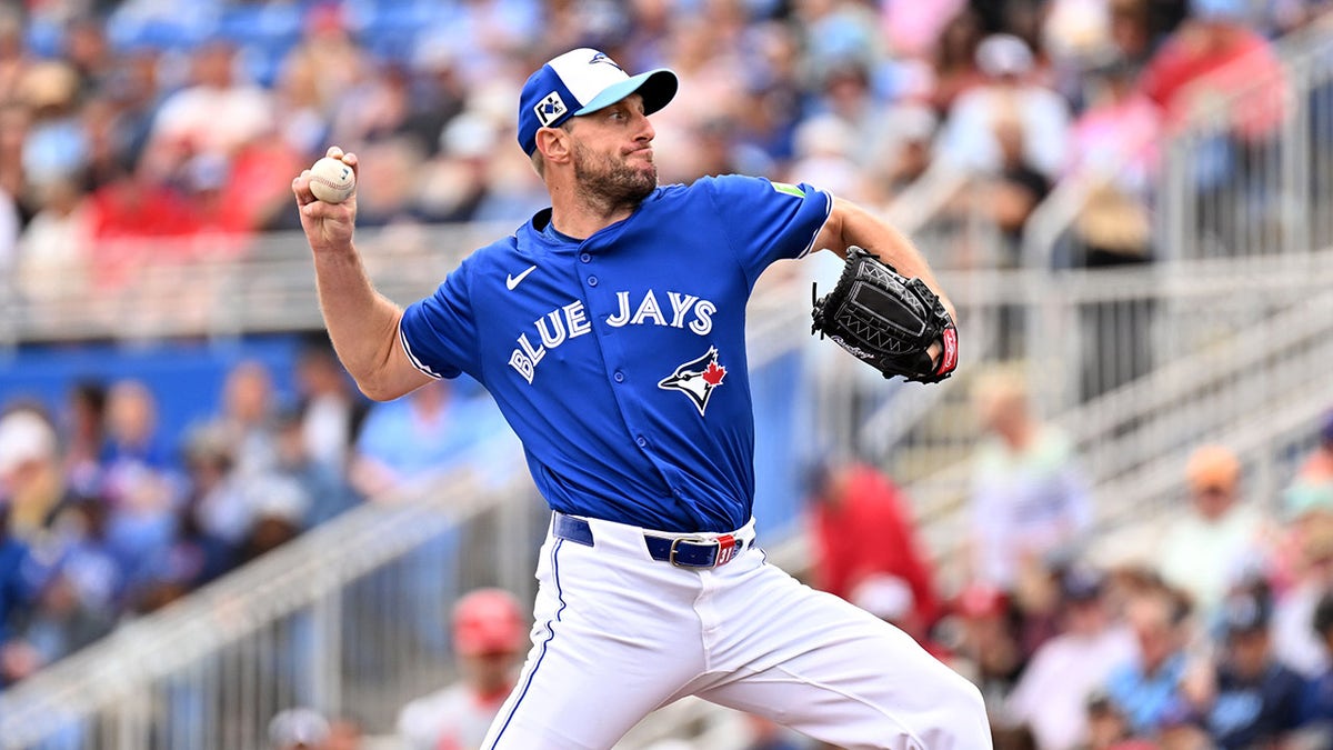 Automated balls and strikes, ABS challenge system, MLB, Max Scherzer, Rob Manfred, umpire, baseball, Toronto Blue Jays, pitch timer, larger bases, shift limits, attendance, Sammy Sosa, Chicago Cubs.
