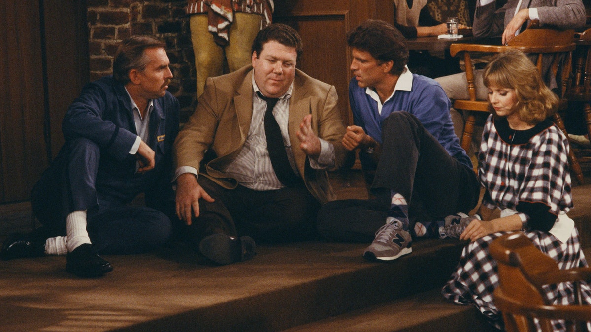 Cheers, John Ratzenberger, Cliff Clavin, Shelley Long, Ted Danson, fan encounter, samurai sword, security, Still Here Hollywood, podcast, Kelsey Grammer, audience member, stalking, celebrity safety, TV show, 1980s, 1990s, Cheers cast, Woody Harrelson, Kirstie Alley, Rhea Pearlman, celebrity stalker, entertainment news
