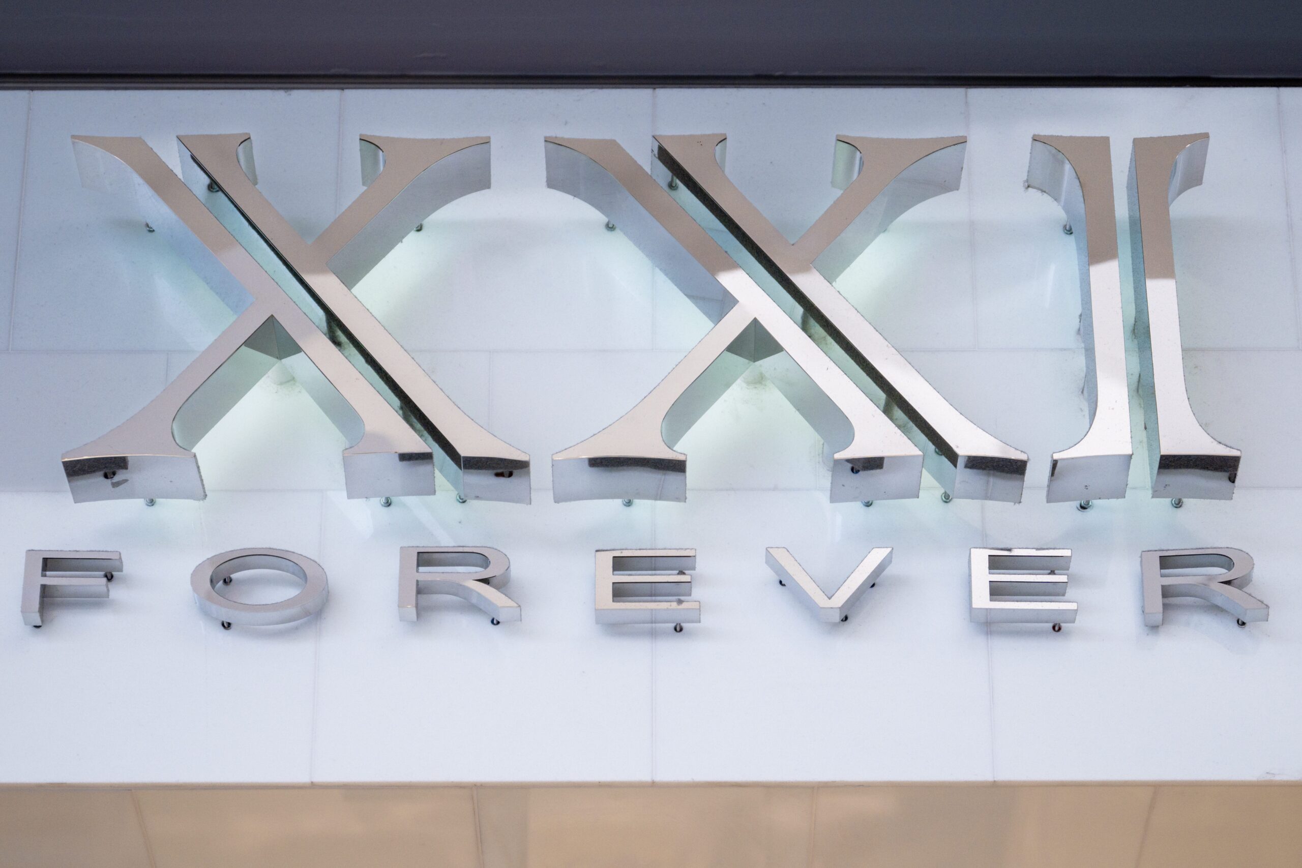 Forever 21, store closings, layoffs, Los Angeles, corporate office, headquarters, WARN notice, financial woes, Shein, Temu, online retailers, bankruptcy, Authentic Brands Group, liquidation, Chapter 11, retail, Jamie Salter, Debtwire
