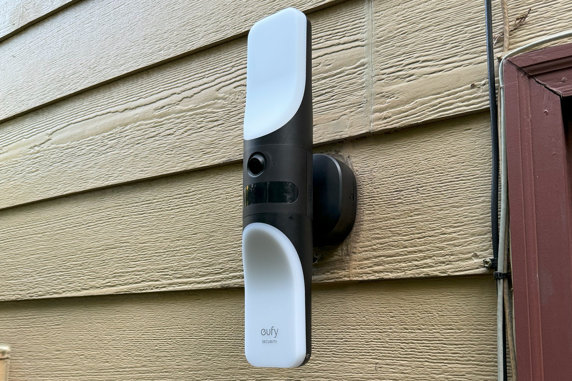 Eufy Wired Wall Light Cam S100, security camera, porch light, smart home, home security, review, price, features, installation, video quality, Netatmo Smart Outdoor Camera, floodlight camera, Eufy Security Solar Wall Light Cam S120, outdoor lighting, 2K video, motion detection, night vision, HomeBase 3, Alexa, Google Home, IP65, weather resistant
