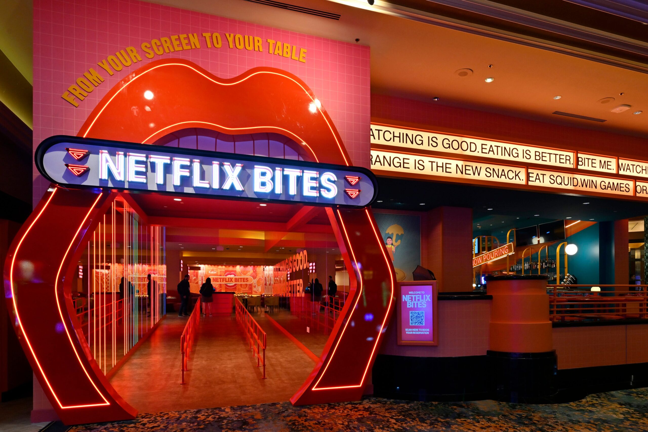 Netflix Bites, Las Vegas restaurant, themed dining, Netflix restaurant, MGM Grand, Squid Game, Bridgerton, Emily in Paris, School of Chocolate, Floor is Lava, Matilda the Musical, Netflix experiences, experiential entertainment, restaurant review, Las Vegas dining, influencer dining, Instagrammable food, TV-themed restaurant, pop-up restaurant, Netflix House, Orange is the New Mac, The Hellfire Club, Red Bite, Green Bite, Nachos Nevermore, Schooled by Brookie, The Dessert is Lava, Trunchbull's Chocolate Cake, Poke Taco, Sex Education Hoagie, The Pink Soldier, reservations
