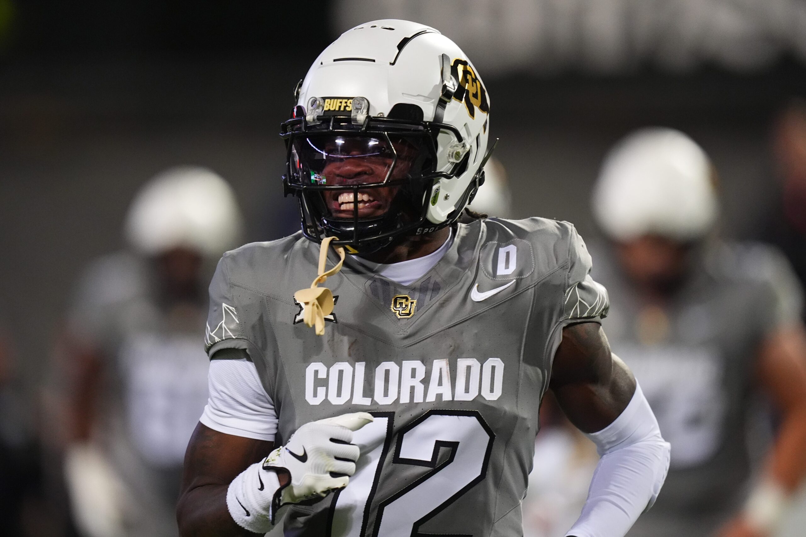 Travis Hunter, NFL Draft, Colorado, dual-threat player, Heisman Trophy, wide receiver, cornerback, two-way player, NFL Combine, Deion Sanders
