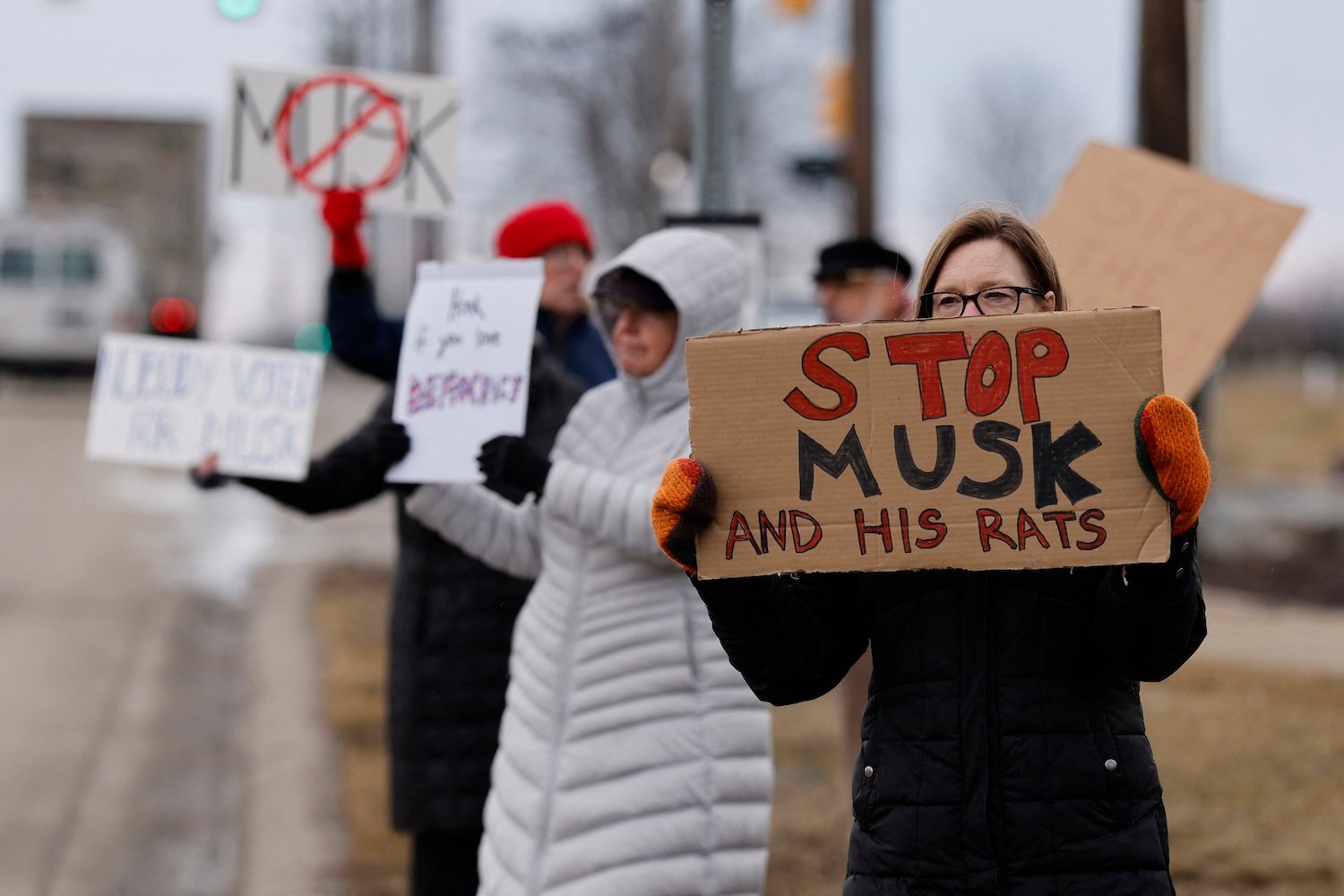 Elon Musk, Tesla, SpaceX, protest, Tesla Takedown, DOGE, Donald Trump, government, activism, Alex Winter, BostonJoan, 50501, shareholder vote, divestment, federal budget, U.S. government, Musk protests, Tesla stock, criminal activities
