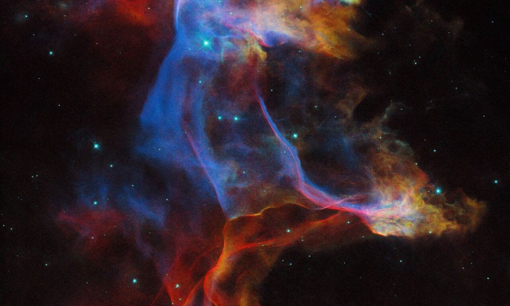 Hubble Space Telescope, Veil Nebula, supernova remnant, space image, astronomy, astrophysics, nebula colors, Wide Field Camera 3, Hubble 35th anniversary, space exploration, gas and dust clouds, stellar evolution, ionized elements, hydrogen, sulfur, oxygen, nebula dynamics, supernova explosion
