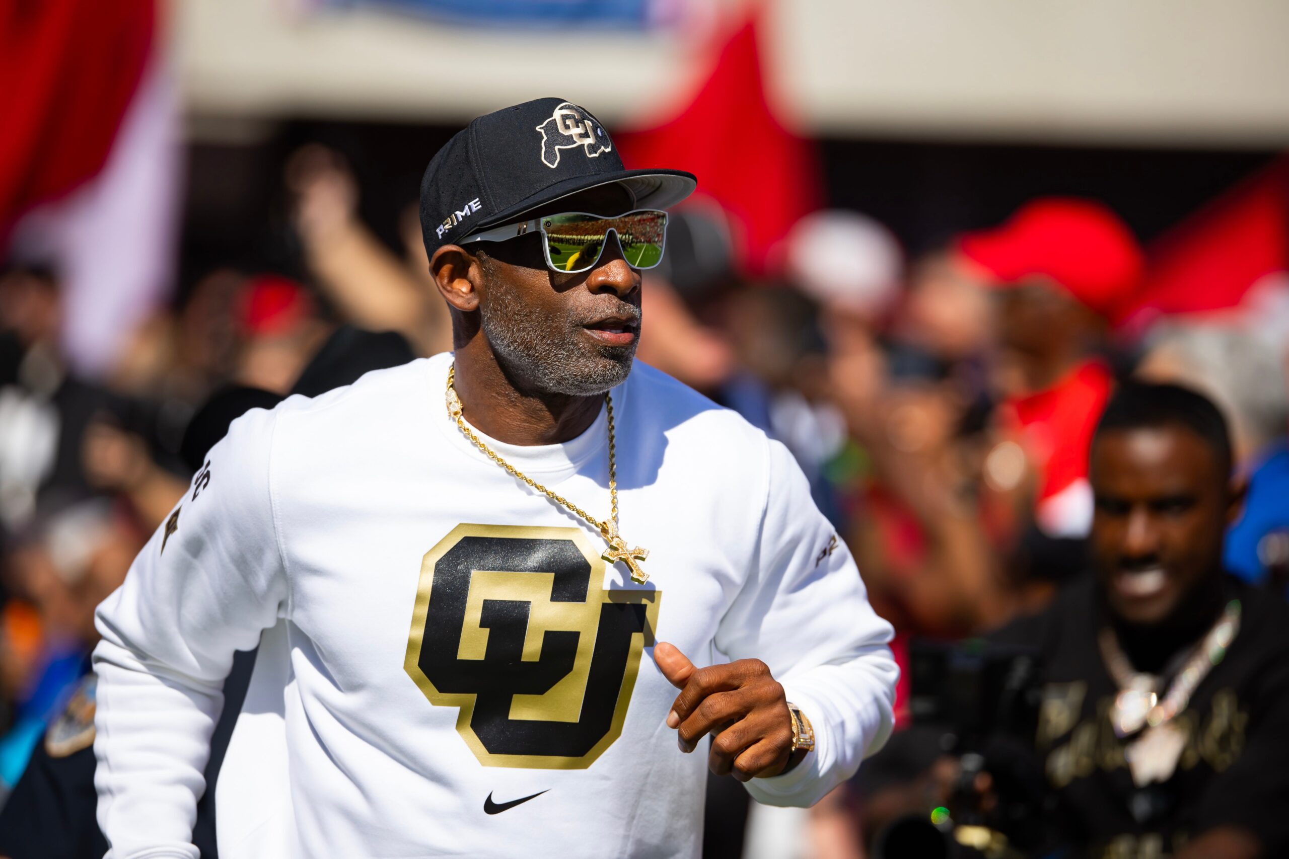Deion Sanders, Colorado Buffaloes, football coaching, offensive line, Andre Gurode, Gunnar White, George Hegamin, Phil Loadholt, NCAA rule change, recruiting, Robert Livingston, salary, coaching staff, college football
