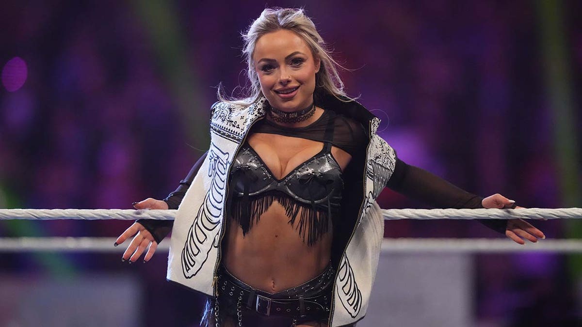 Liv Morgan, WWE, Elimination Chamber, Bianca Belair, Paul Levesque, Triple H, wrestling, women's tag-team champions, injuries, bruises, scrapes, performance, mega star, Fox News Sports
