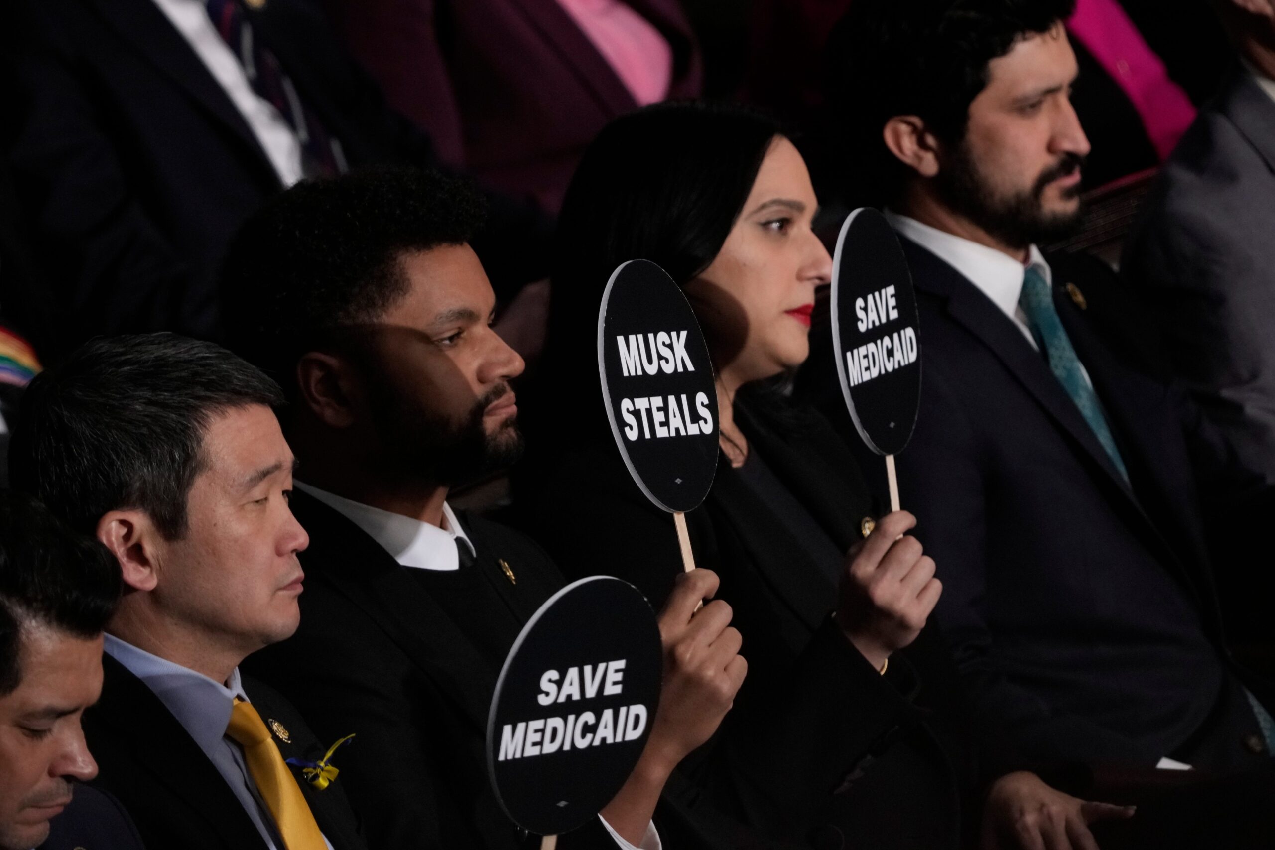 Donald Trump, Joint Session of Congress, Democratic protest, Republican response, Melanie Stansbury, Lance Gooden, Al Green, Mike Johnson, Gil Cisneros, Rashida Tlaib, Sydney Kamlager-Dove, Save Medicaid, Protect Veterans, Impeachment, Gaza, Medicare cuts, Medicaid cuts, Social Security cuts, RESIST, Trump speech, Political protest, Congressional disruption, Partisan politics, USA TODAY
