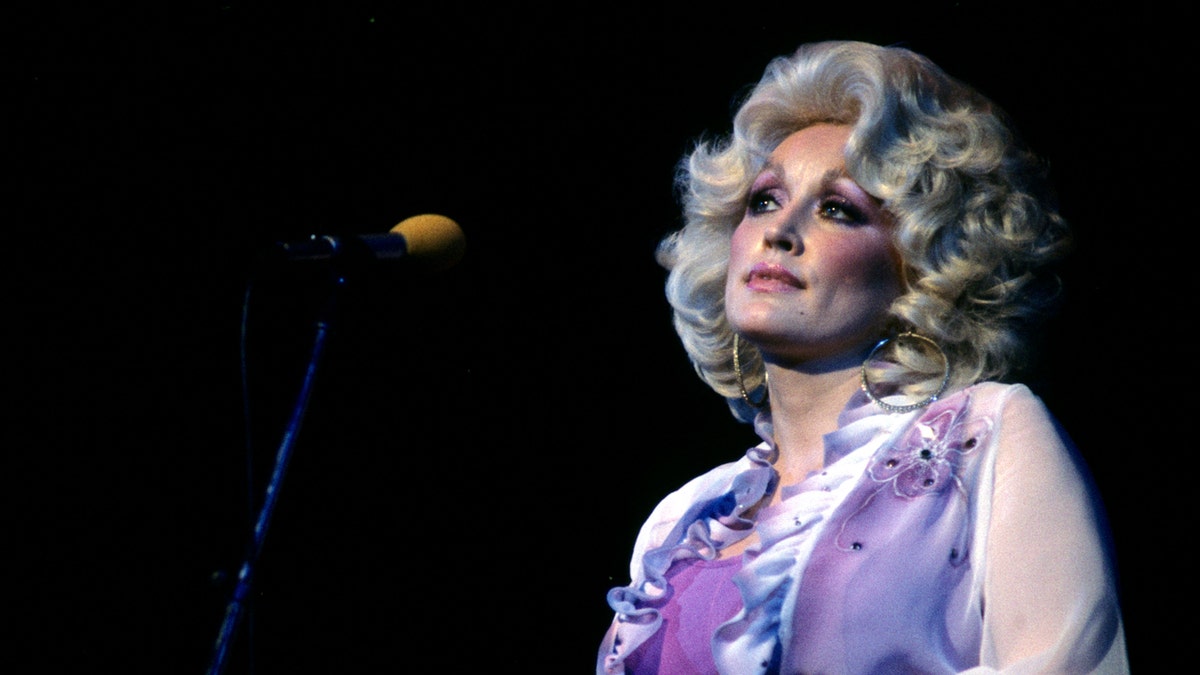 Dolly Parton, Carl Dean, Jolene, country music, death, obituary, inspiration, song, lyrics, Billboard, Miley Cyrus, Beyoncé, Cowboy Carter, Nashville, marriage, laundromat

