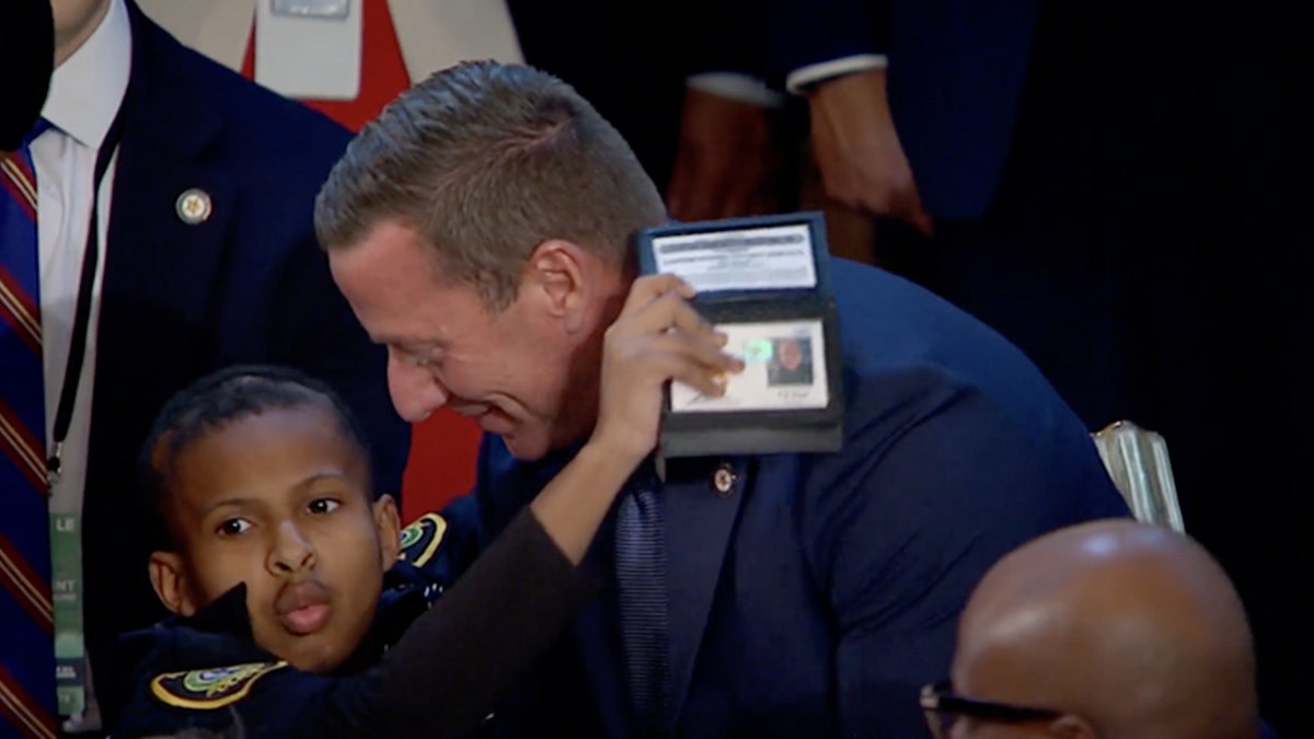 Donald Trump, Devarjaye Daniel, DJ Daniel, Make America Healthy Again, MAHA, childhood cancer, Robert F. Kennedy Jr., RFK Jr., Secret Service, honorary agent, Sean Curran, health, cancer research, pediatric cancer, Congressional Childhood Cancer Caucus, Fox News, health news, Texas, law enforcement, honorary officer, cancer diagnosis, cancer treatment, health policy, health initiatives, medical research, children's health
