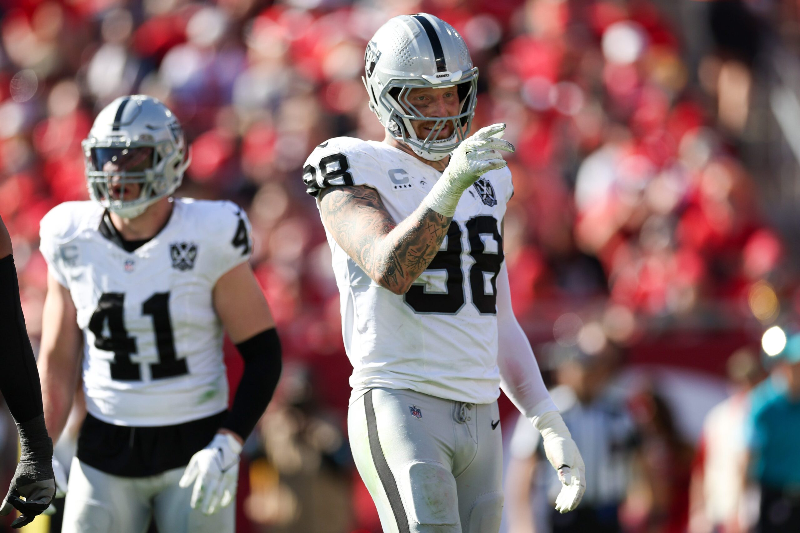 Maxx Crosby, Las Vegas Raiders, contract extension, NFL, defensive end, highest-paid non-quarterback, Pete Carroll, John Spytek, Tom Brady, trade rumors, Pro Bowl, Mad Maxx, NFL news, football

