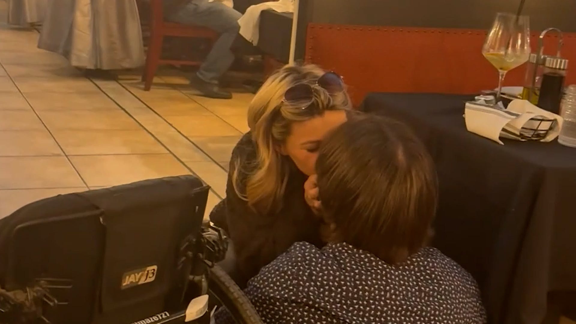 Michael Maze, Trinity Brooks, paraplegic proposal, wheelchair proposal, romantic proposal, Tulare California, motocross accident, anniversary surprise, Hallmark movie proposal, love story, inspirational story, viral video, wedding proposal, restaurant proposal, feel-good story, disability, love overcomes obstacles, grand gesture, best night of our lives

