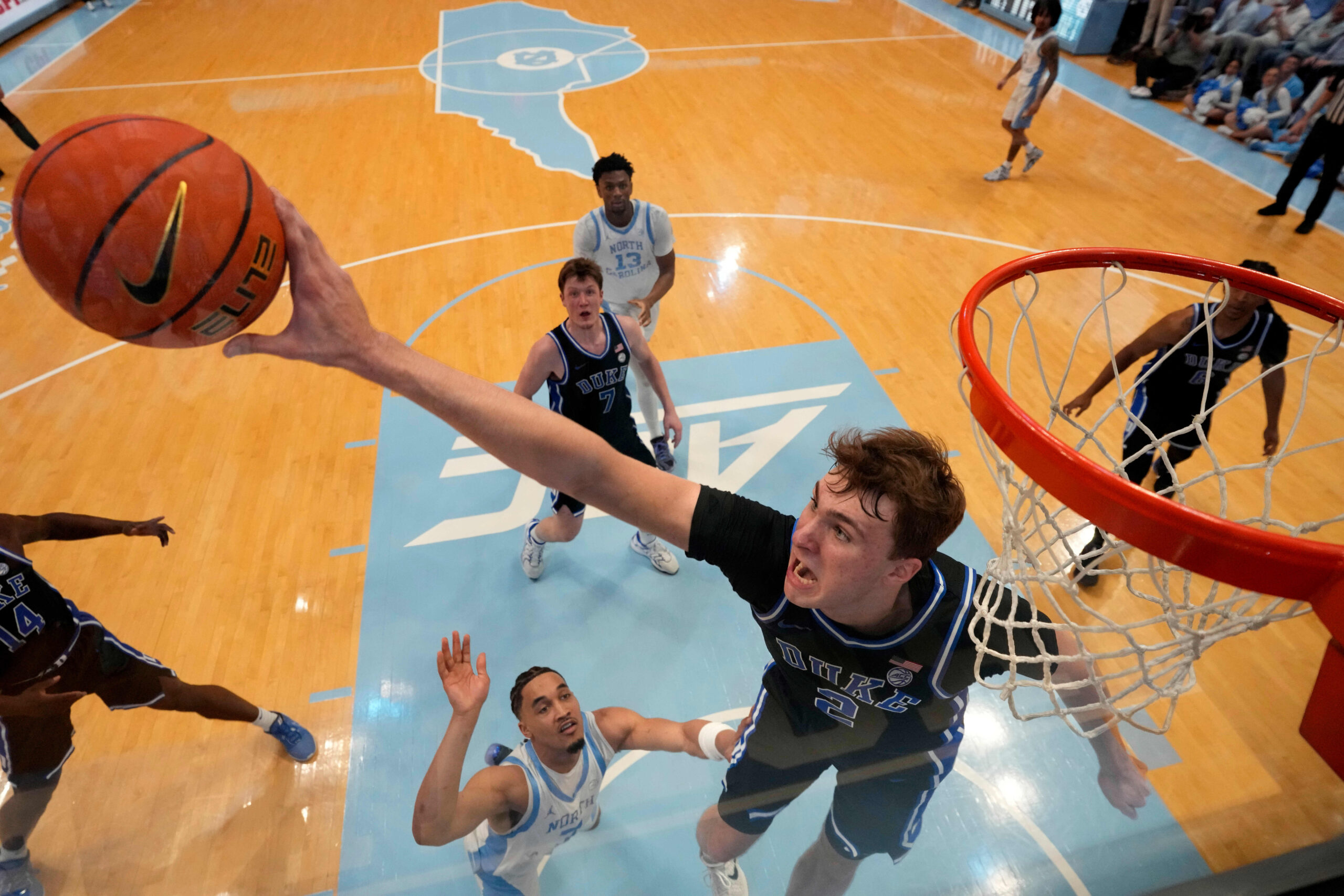 March Madness, NCAA Tournament, college basketball, conference tournaments, Selection Sunday, basketball predictions, tournament picks, Duke, Houston, Big Ten, SEC, Big East, ACC, Big 12, Memphis, VCU, Gonzaga, Utah State, Maryland, Florida, Iowa State, Saint Marys, team analysis, expert opinions, tournament preview, 2025 NCAA Tournament
