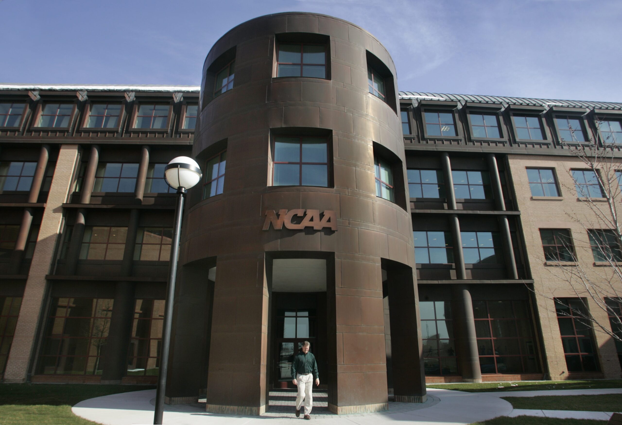 NCAA, athlete compensation, antitrust settlement, Power Five conferences, NIL, name image likeness, NIL payments, Division I, college athletics, sports law, fair market value, Settlement Implementation Committee, LBi Software, Deloitte Consulting, college sports regulation, athlete endorsements, NIL deals, college sports reform, NCAA rules changes, college athletes, sports business.
