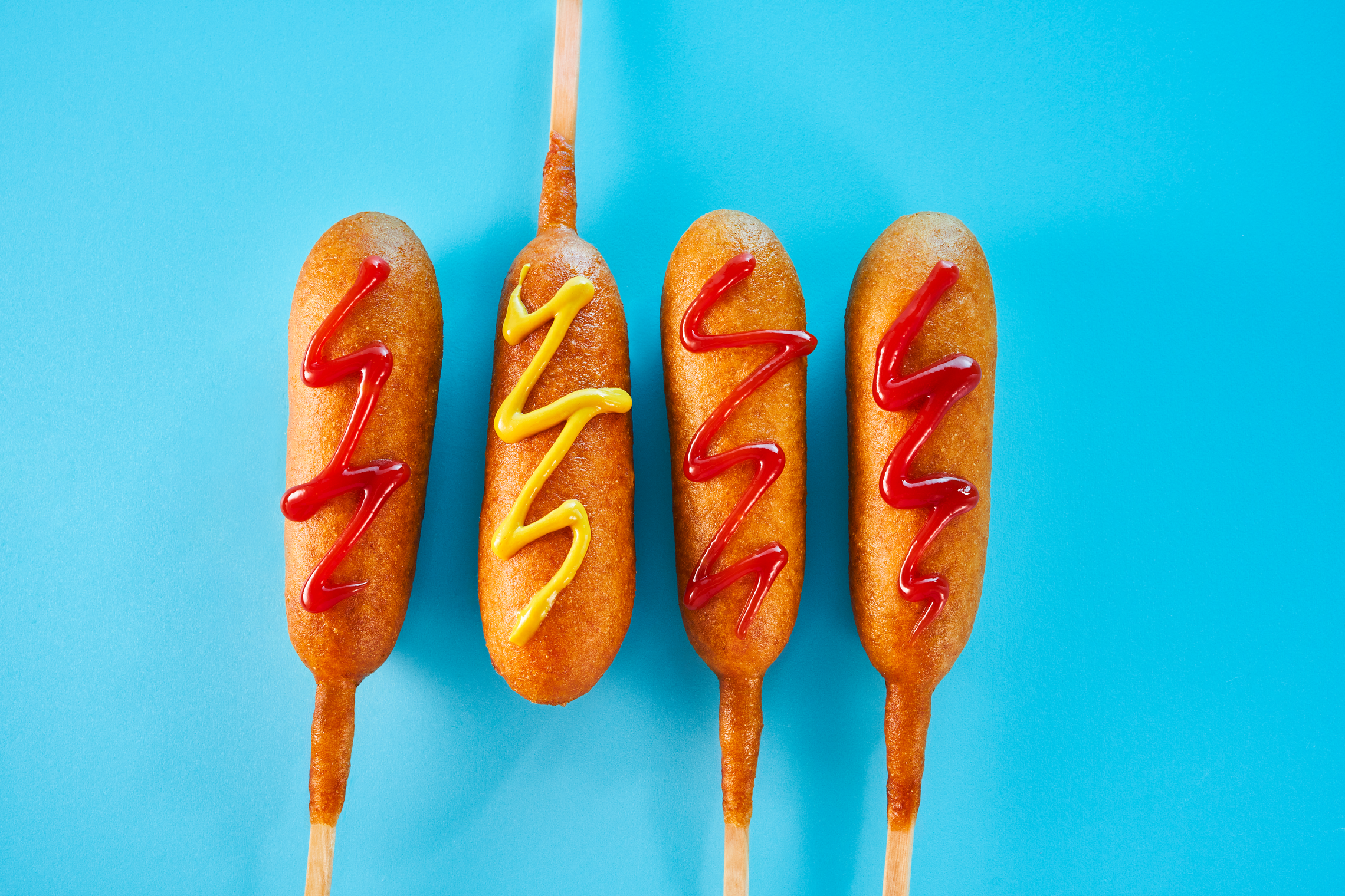 Sonic, corn dogs, National Corn Dog Day, 99-cent corn dogs, fast food, deals, discounts, promotions, Strawberry Mangonada Slush, limited-time offer, Daily Cravings & Savings menu, Oklahoma City, American food, fried food, hot dog, Sonic App, Flavorista Favorites, Tajín Clásico, chili lime seasoning, Groovy Fries, Tots, Soft Pretzel Twist, Grilled Cheese Burger, Small Cream Slushes, Queso Wraps, Quarter Pound Double Cheeseburgers, Classic Sonic Cheeseburgers, Chili Cheese Coneys
