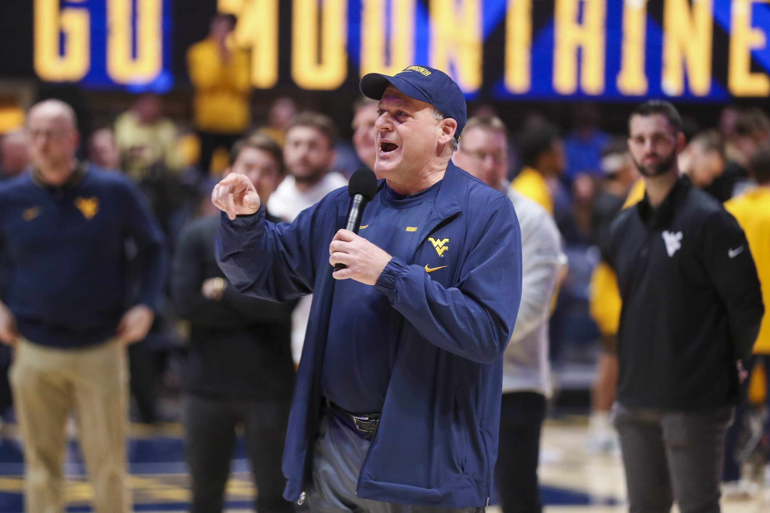 Rich Rodriguez, West Virginia Football, TikTok ban, college football, social media, player discipline, 2025 season, Travis Hunter, football training, Week Zero, Labor Day weekend
