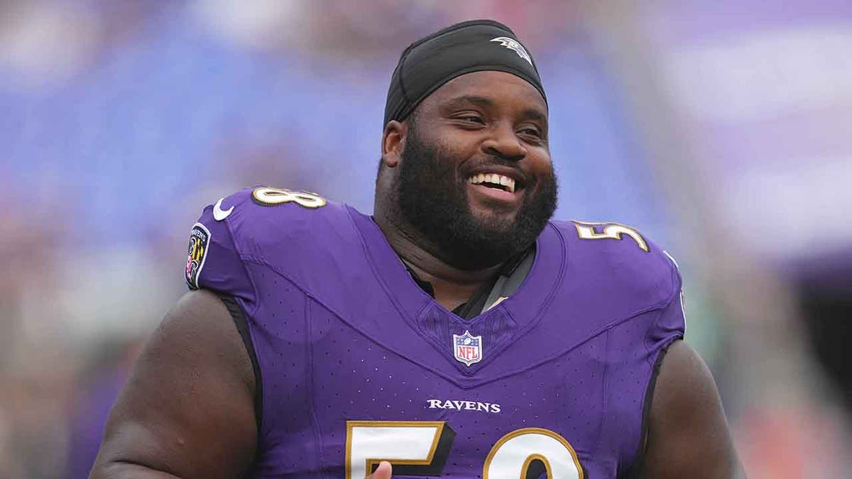 Michael Pierce, Baltimore Ravens, NFL, retirement, Ozzie Newsome, Minnesota Vikings, DeAndre Hopkins, interception, Bailey Zappe, football
