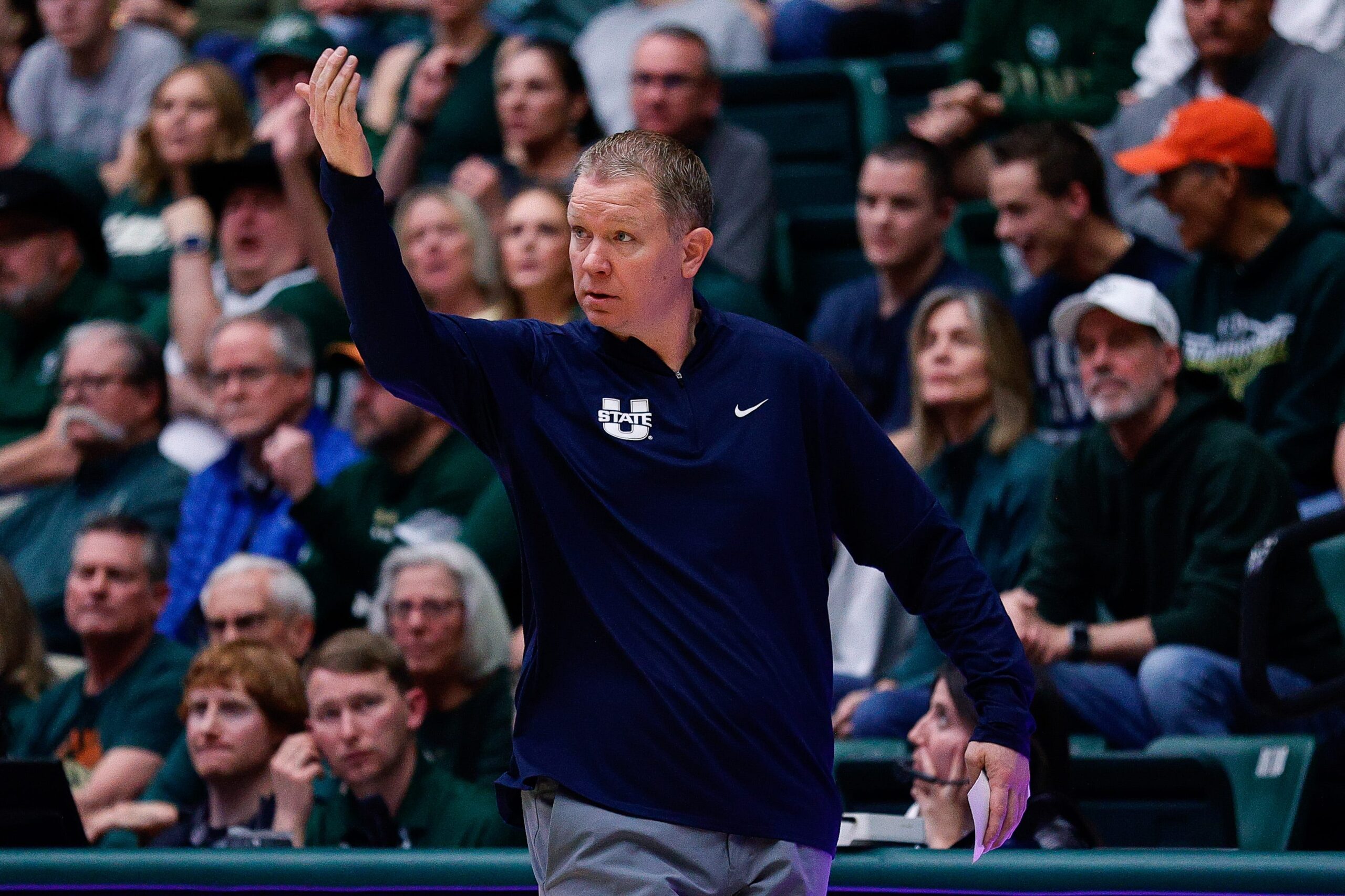 Utah State Aggies, Jerrod Calhoun, NCAA Tournament, Mountain West Conference, college basketball, coaching carousel, Danny Sprinkle, Ryan Odom, Craig Smith, Dee Glen Smith Spectrum, HURD, Diana Sabau, Southern Illinois Salukis, Stew Morrill, Pac-12, basketball
