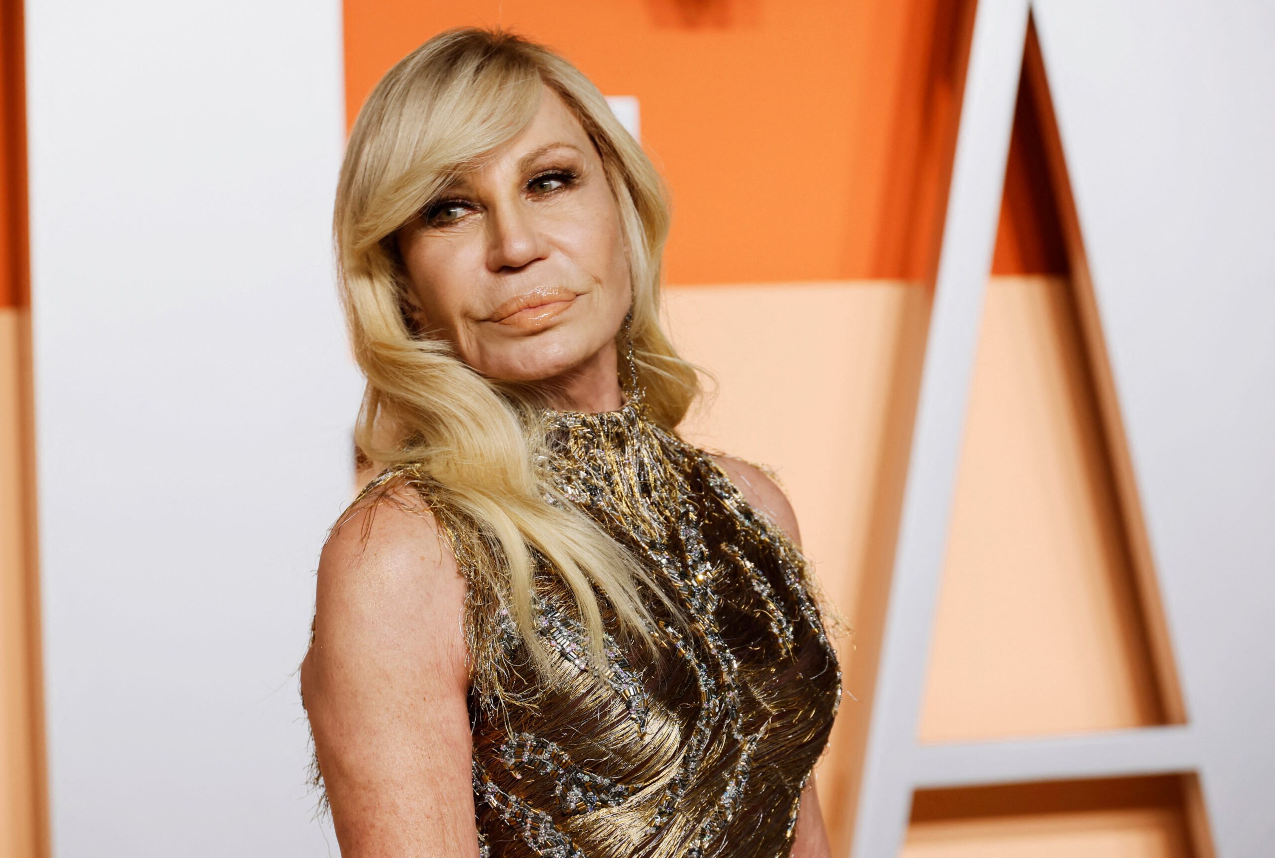 Donatella Versace, Versace, Gianni Versace, Dario Vitale, Chief Brand Ambassador, creative director, fashion, luxury fashion, Prada, Capri Holdings, Jennifer Lopez, Dua Lipa, Kardashian-Jenner, Milan Fashion Week, assassination, Miu Miu, fashion industry, fashion news, designer, celebrity, A-list celebrities
