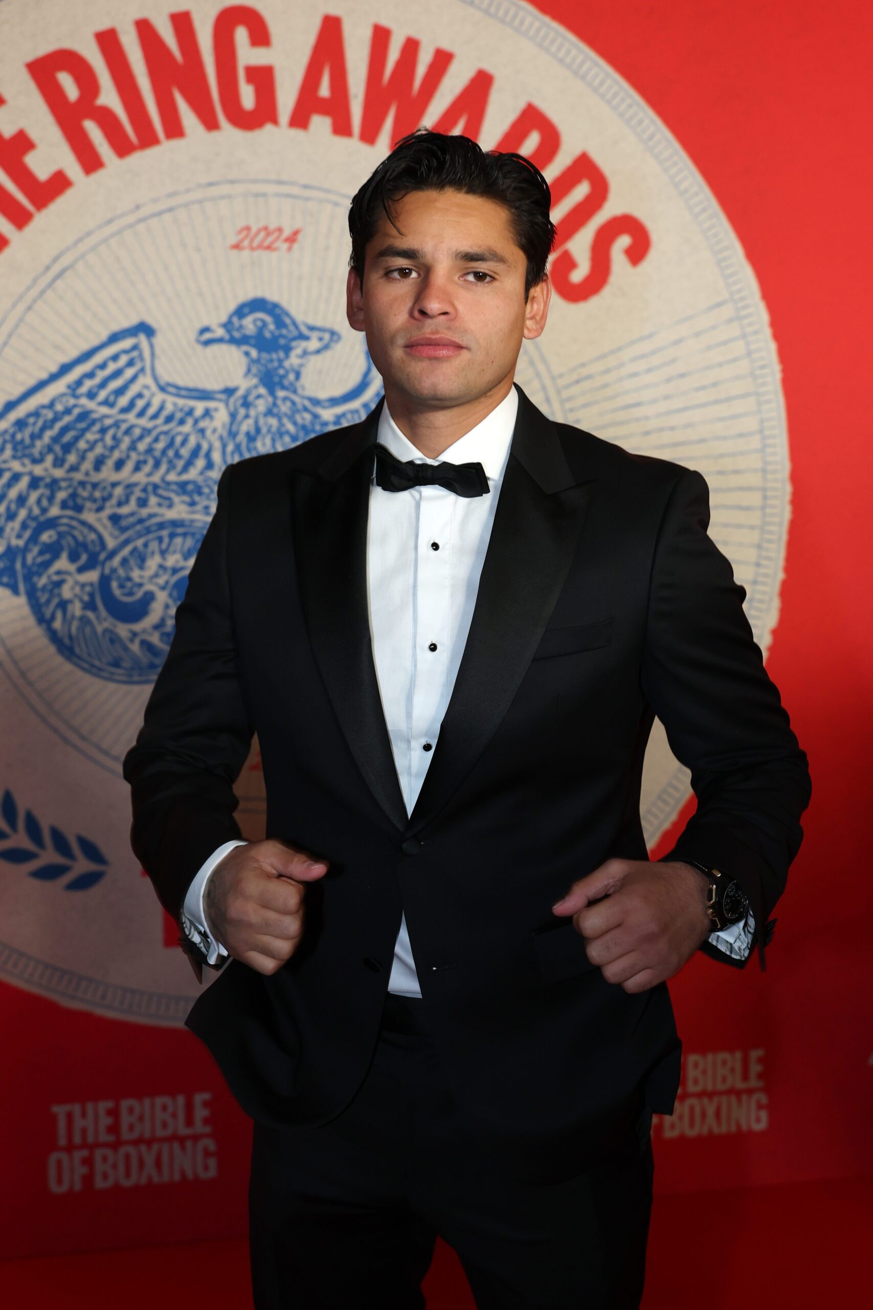 Ryan Garcia, lawsuit, Fanmio, Golden Boy Promotions, Rukiya Anpo, boxing, exhibition fight, breach of contract, injury, Rolly Romero, Times Square Fight, Ostarine, suspension, Oscar De La Hoya, legal action, sports law
