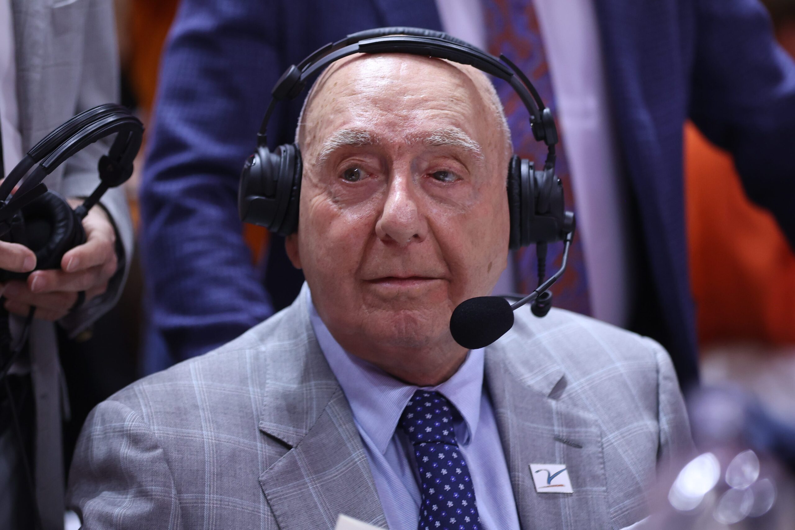 Dick Vitale, cancer battle, ESPN, Duke-Louisville, ACC championship, melanoma, lymphoma, vocal cords, chemotherapy, cancer-free, broadcast, Dave O'Brien, Cory Alexander, Hall of Famer, cancer support, positive thinking, faith, overcoming adversity, USA TODAY, Craig Meyer.
