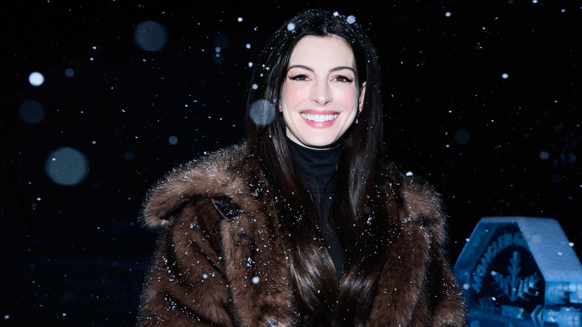 Moncler, Grenoble, fashion show, Courchevel, Altiport, Anne Hathaway, Penn Badgley, Jessica Chastain, Adrien Brody, Vincent Cassel, Brooklyn Beckham, Nicola Peltz Beckham, Nina Dobrev, Chloe Kim, Ashley Park, fall/winter collection, ski suits, coats, knitwear, celebrity style, fashion week, Alps, snow, runway, designer fashion
