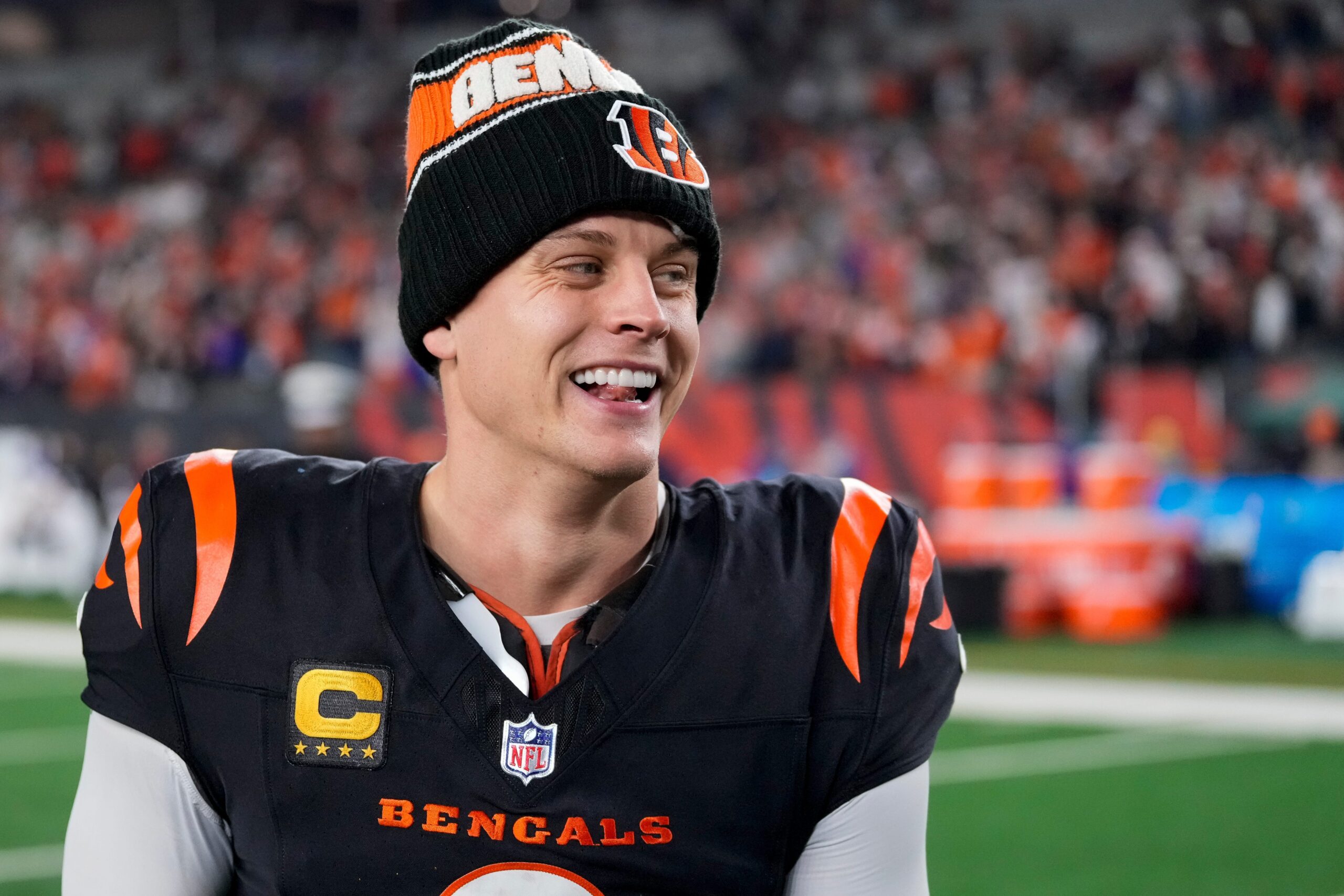 Joe Burrow, Ja'Marr Chase, Tee Higgins, Cincinnati Bengals, NFL, salary cap, wide receivers, contract negotiations, Super Bowl, Brett Veach, Philadelphia Eagles, Kansas City Chiefs, Tyreek Hill, Trey Hendrickson, Joe Mixon, NFL Draft, offensive strategy, team building, football analysis, NFL news.
