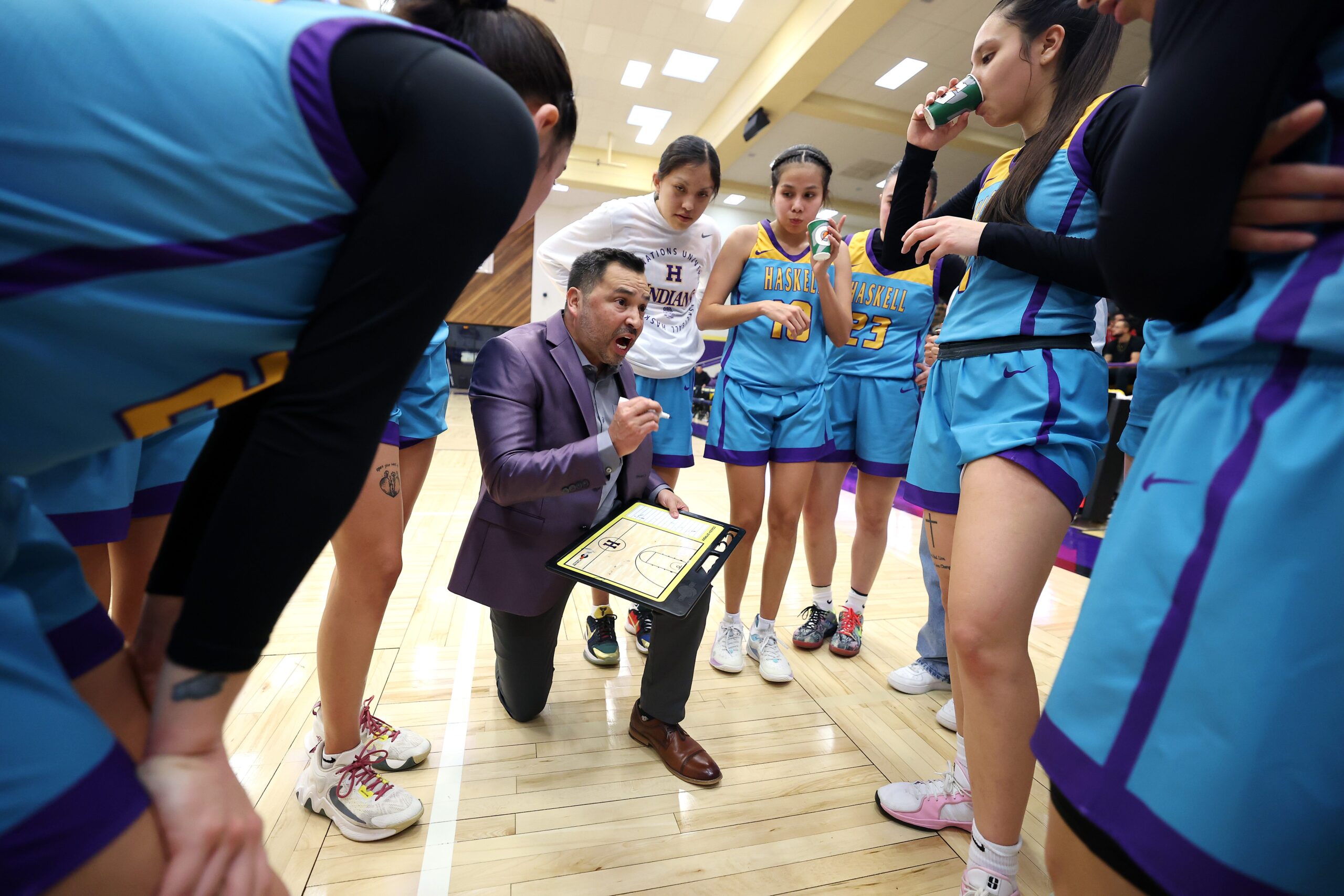 Haskell Indian Nations University, Adam Strom, women's basketball, March Madness, NAIA tournament, Native American, layoffs, Department of Government Efficiency, DOGE, Elon Musk, Donald Trump, tribal nations, Native American Rights Fund, Jacqueline De Leon, Fighting Indians, Continental Athletic Conference, North Mexico College, Mahpiya Irving, Lish Spoonhunter, Star Her Many Horses, Lilly Smith, Jim Thorpe, Billy Mills, Bilingual Basketball, Relyn Strom, Francis Arpan, Zach Wilkerson, Bureau of Indian Affairs, BIE, Dordt, Sioux Center, Iowa
