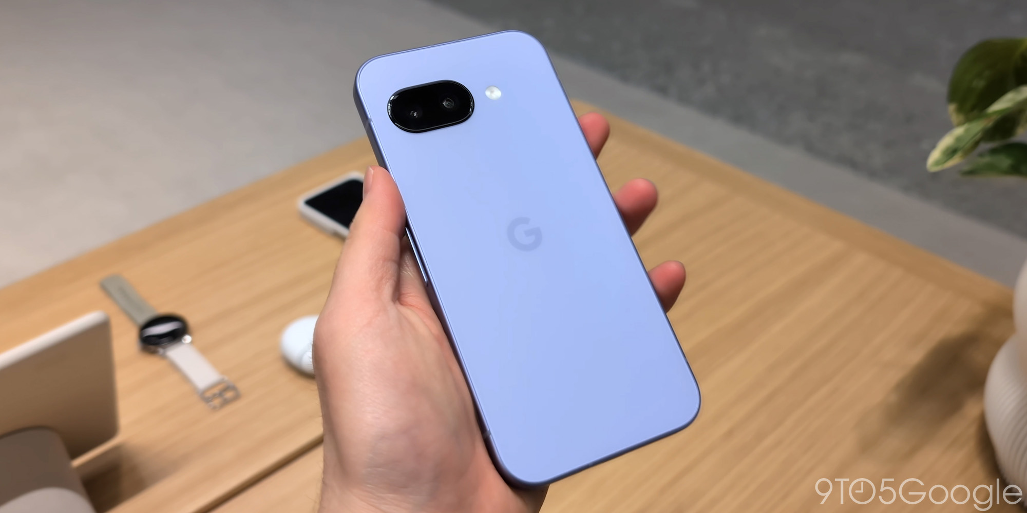 Pixel 9a, Google Pixel, mid-range phone, 2025, Android 15, Tensor G4, camera, battery, display, price, release date, specs, features, review, hands-on, bezels, Actua display, Gorilla Glass 3, metal frame, plastic back, IP68, water resistance, camera bar, vapor chamber, Super Res Zoom, Macro Focus, ultrawide, selfie camera, Add Me, Best Take, Photo Unblur, Magic Editor, Audio Magic Eraser, Panorama, Night Sight, Face Unlock, fingerprint sensor, Google VPN, Pixel Screenshots, Studio, Weather, Gemini Advanced, Obsidian, Porcelain, Peony, Iris, 128GB, 256GB
