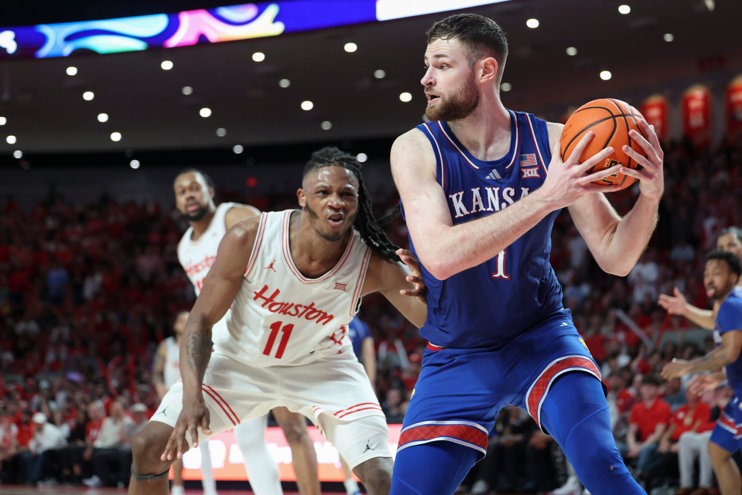 Kansas basketball, Bill Self, March Madness, NCAA Tournament, AI prediction, Microsoft Copilot, bracket, upsets, Hunter Dickinson, Dajuan Harris, Arkansas, John Calipari, national championship
