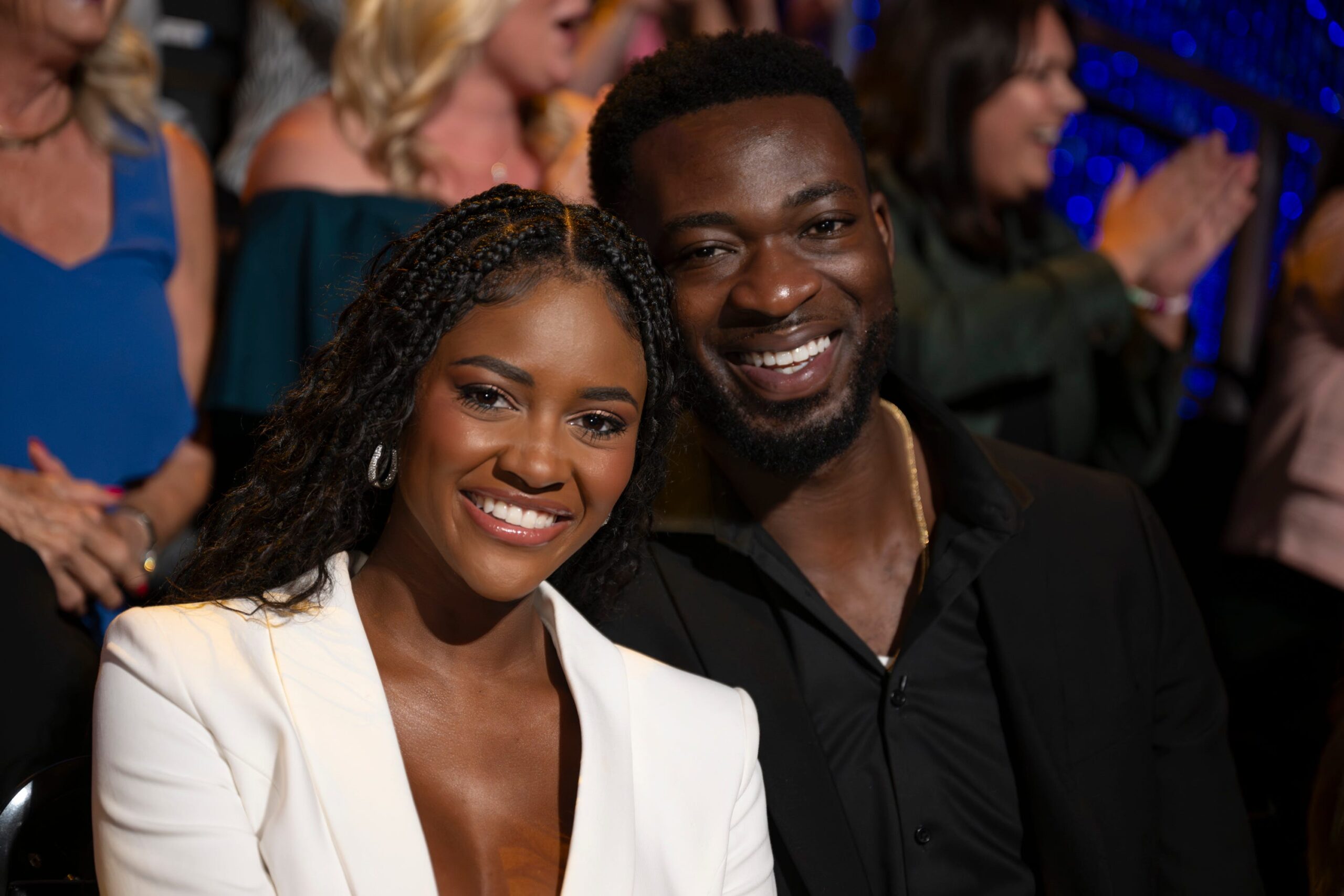 Charity Lawson, Dotun Olubeko, The Bachelorette, Bachelor franchise, iHeartRadio Music Awards, reality TV, relationship, engagement, wedding plans, Jenn Tran, Grant Ellis, production shake-up, show break, TV break, Bachelor news, Bachelorette news, TV gossip, celebrity interview, reality show drama
