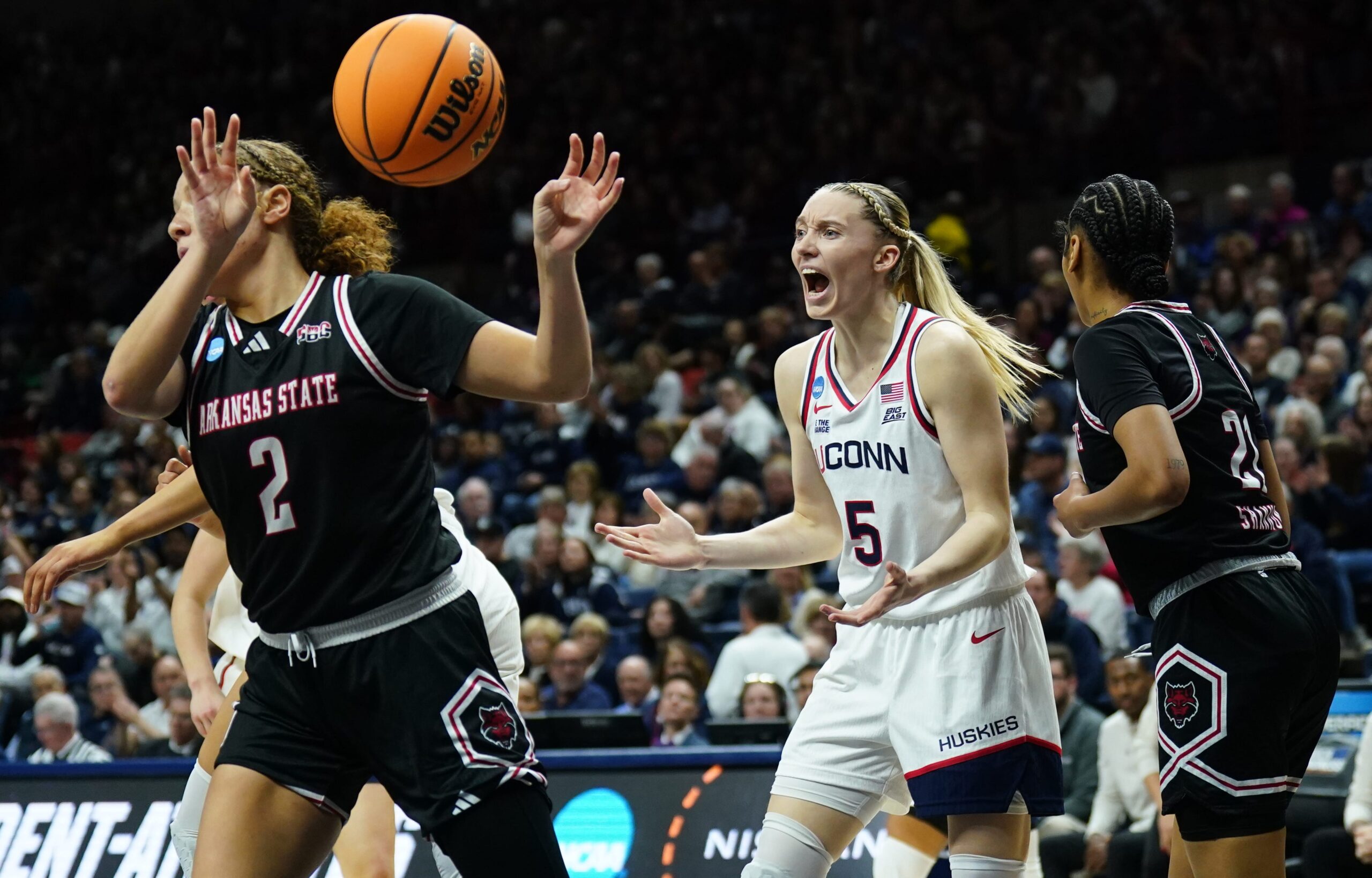 Paige Bueckers, UConn women's basketball, NCAA Tournament, March Madness, Geno Auriemma, Azzi Fudd, Sarah Strong, Arkansas State, Huskies, Final Four, college basketball, women's sports, basketball analysis, sports news, UConn basketball analysis.
