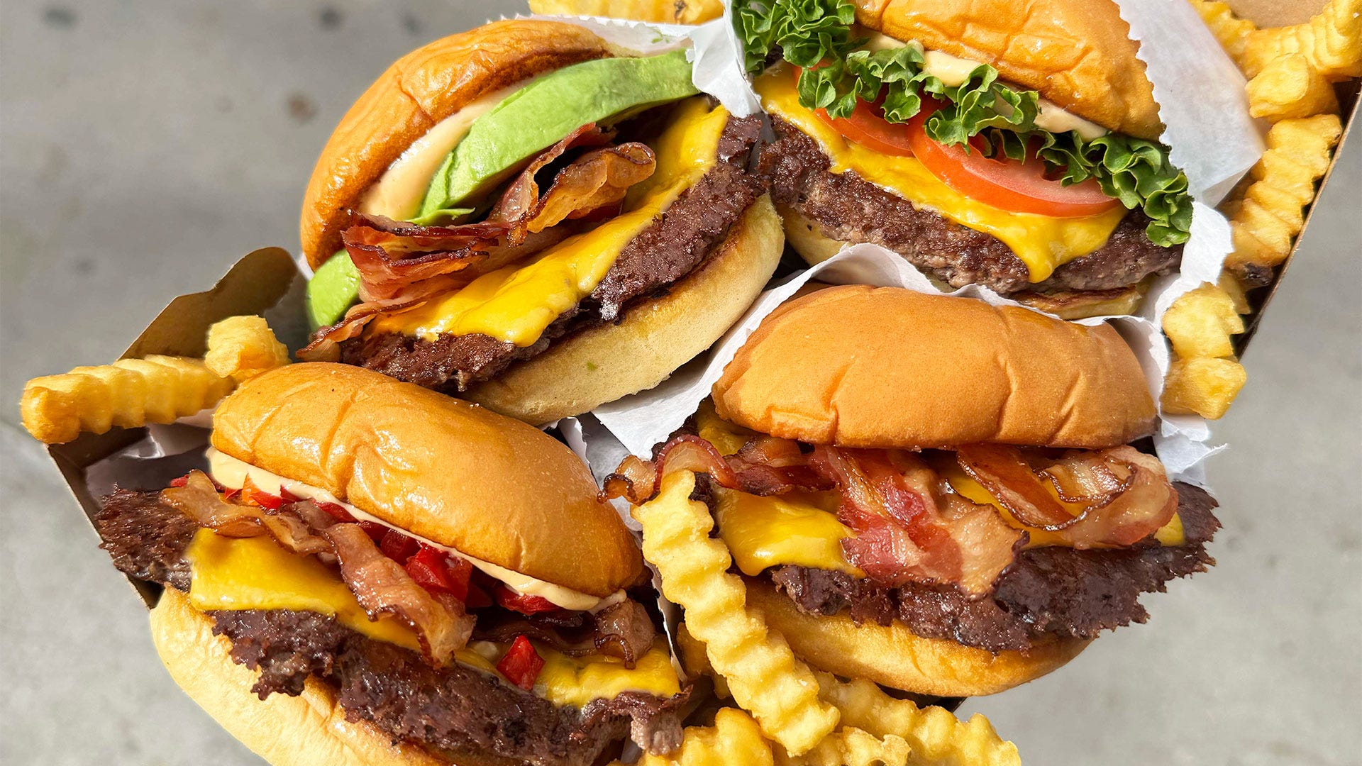 National Burger Month, Shake Shack, free burger, burger deals, May 2024, promo code, BURGERMONTH, fast food, fast casual, Shake Shack app, online order, in-store kiosk, National Burger Day, burger promotion, burger discount
