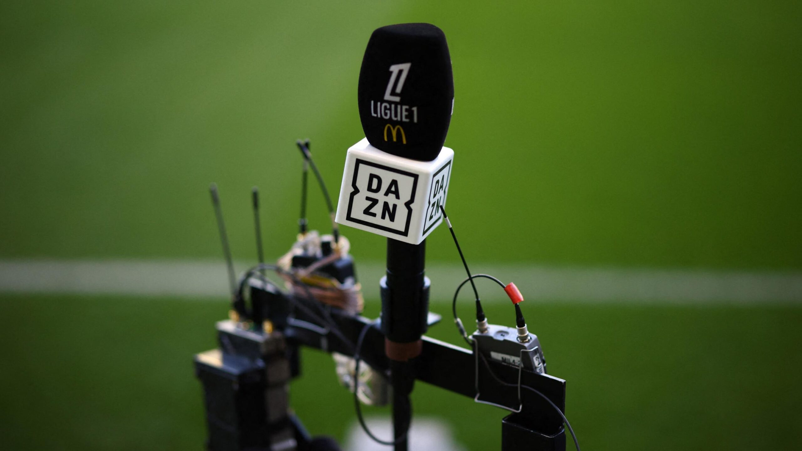 Ligue 1, DAZN, football, sports, broadcast rights, LFP, Ligue de Football Professionnel, agreement, dispute, legal settlement, Nicolas de Tavernost, LFP Media, TV rights, French championship, football channel, investment, piracy, collaboration, economic viability
