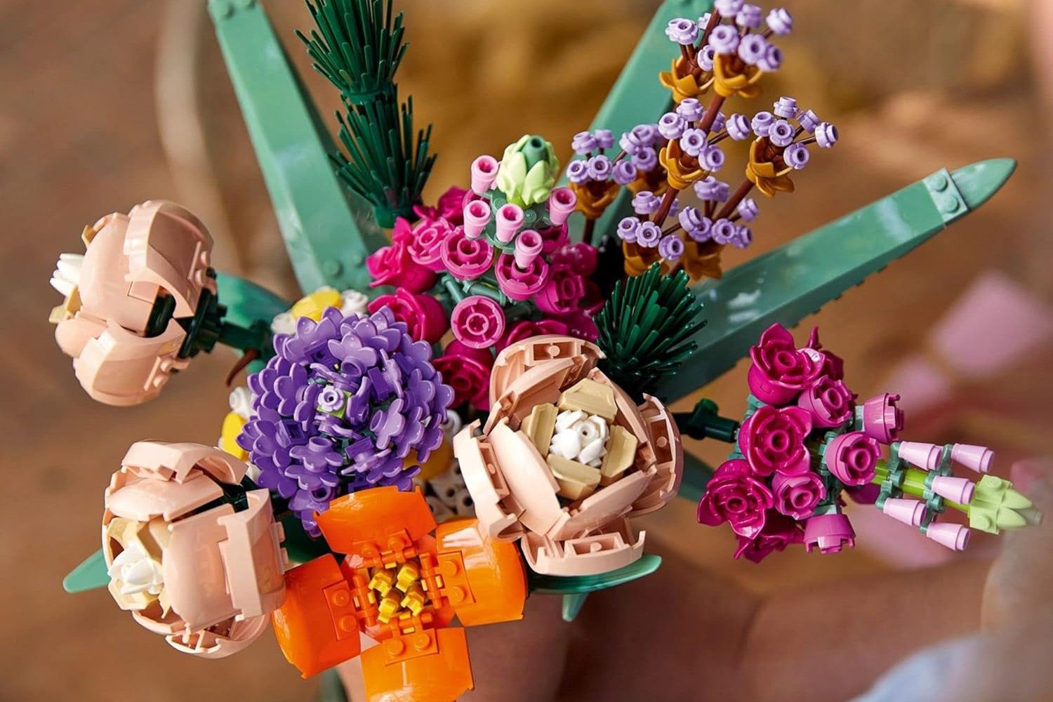 Lego flowers, Lego Icons flower bouquet, artificial flowers, Lego botanical collection, flower bouquet building set, Mother's Day gift, decorative floral arrangement, plastic flowers, Lego set, floral centerpiece, home decor, Amazon deal, discounted Lego set, Lego 10280, Lego 10313, Lego 10314, Lego 10311, roses, snapdragons, poppies, asters, daisies, mindfulness activity, therapeutic activity, building set, posable flowers, adjustable stems
