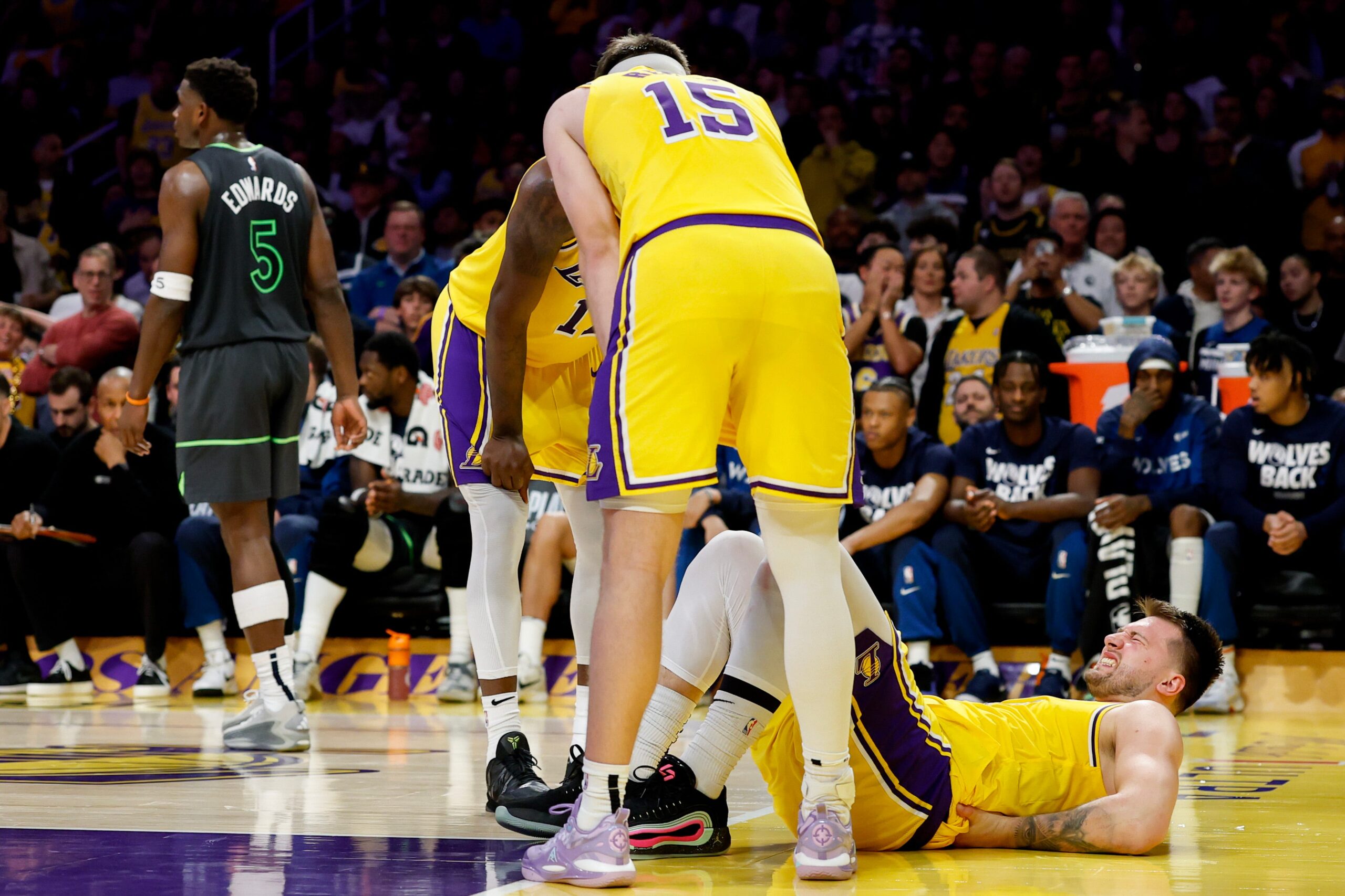 Los Angeles Lakers, Luka Doncic, injury, back pain, Donte DiVincenzo, Rudy Gobert, NBA Playoffs, Game 5, Timberwolves, basketball, sports, news, update
