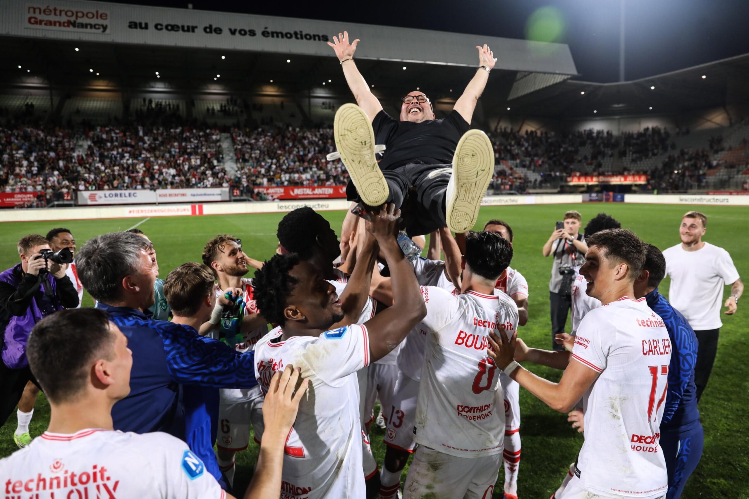 ASNL, Nancy, Ligue 2, promotion, Nîmes, National, football, soccer, results, standings, Le Mans, Boulogne-sur-Mer, Dijon, Aubagne FC, US Orléans, Bourg-en-Bresse, Valenciennes, Sochaux, FC Rouen, Versailles 78, Villefranche Beaujolais, Quevilly-Rouen, Paris 13 Atletico, Châteauroux, relegation, Bordeaux, financial difficulties
