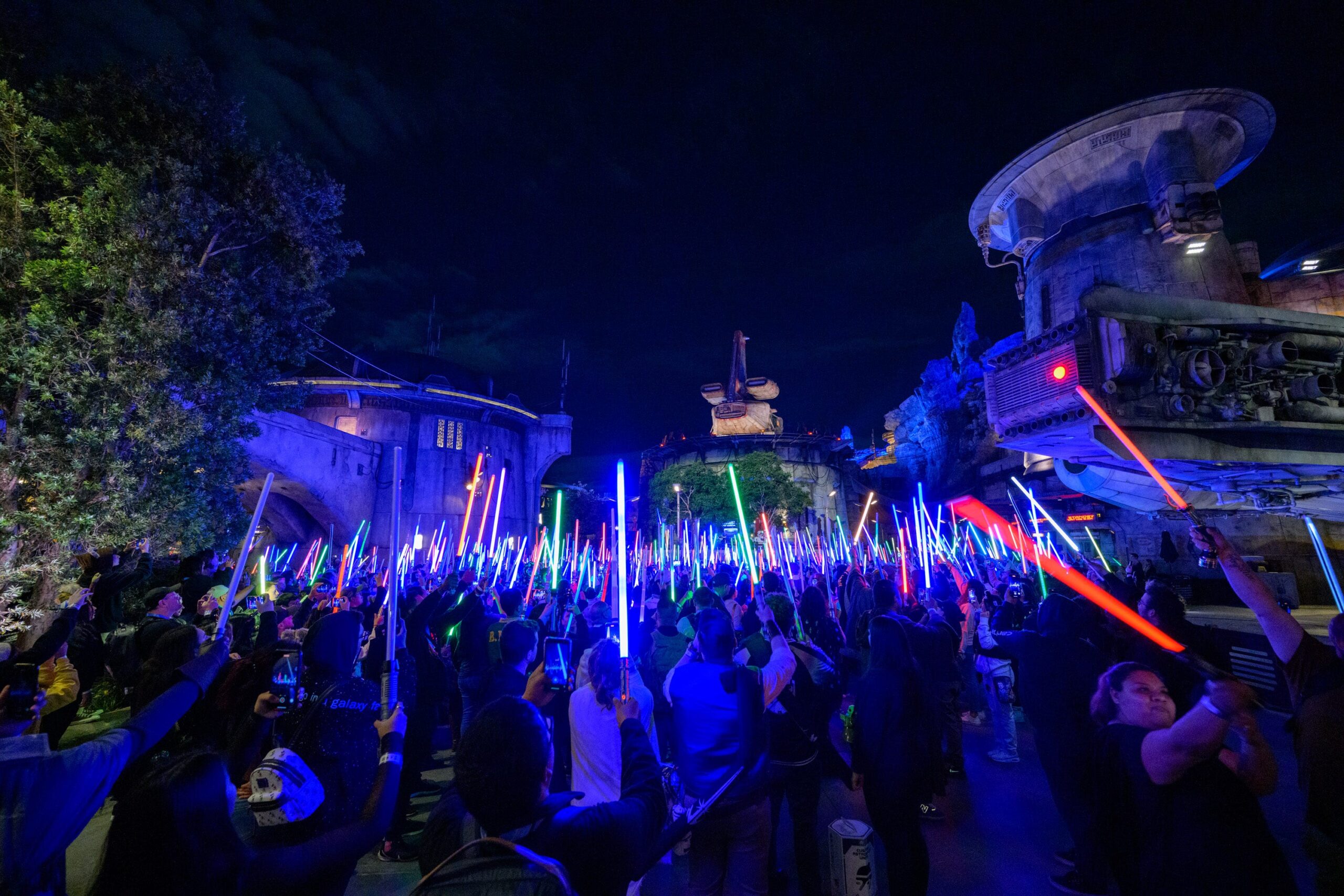 Star Wars, May the 4th, Disneyland, Disney World, Galaxy's Edge, Batuu, Season of the Force, Star Tours, Shadows of Memory, Skywalker Saga, Hyperspace Mountain, Space Mountain, Star Wars Nite, Disney's Hollywood Studios, Star Wars treats, Star Wars merchandise, Star Wars experiences, Star Wars events, Disney Springs
