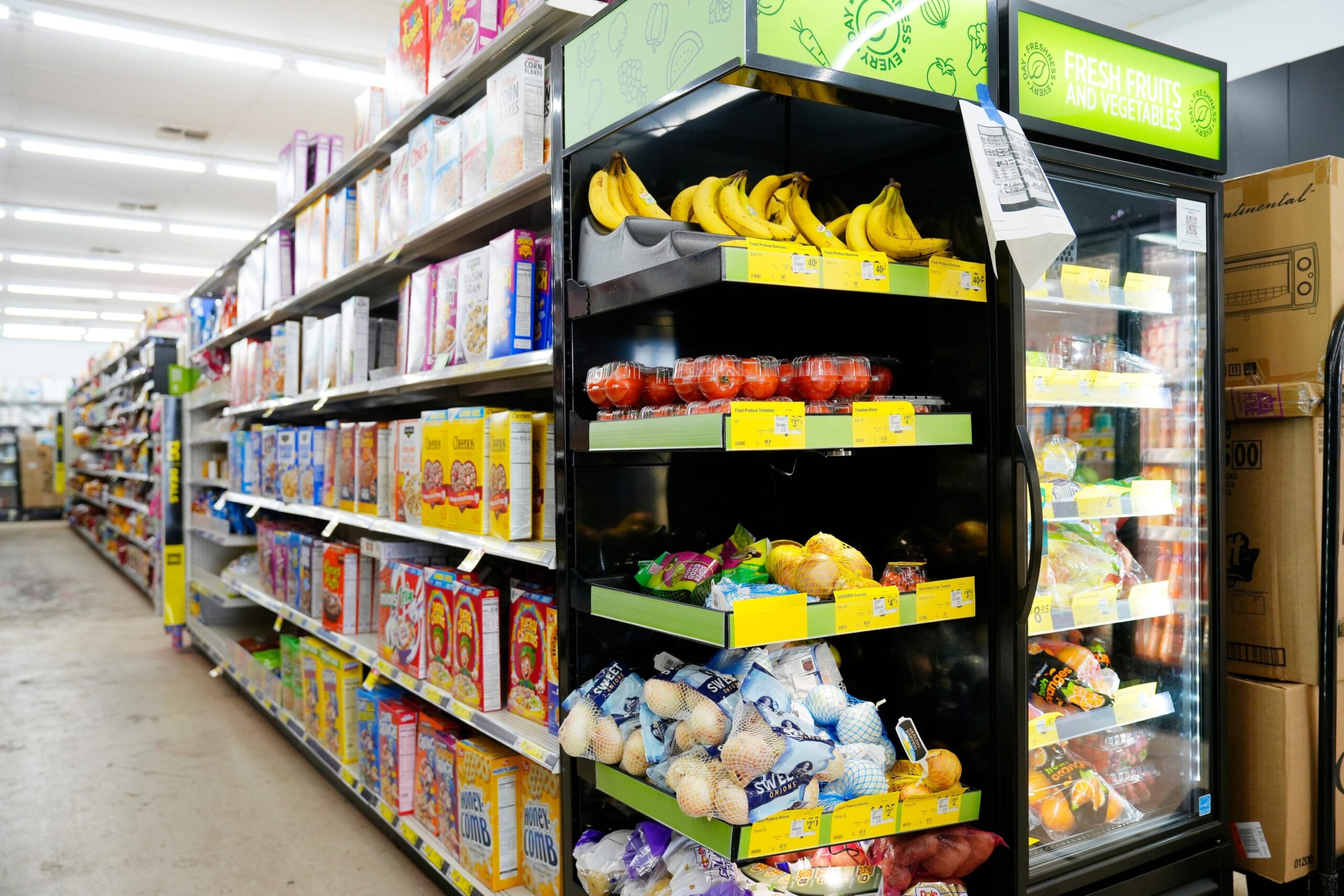 Tariffs, grocery prices, US food supply, food costs, inflation, imported goods, food economics, consumer spending, USMCA, trade war, seafood tariffs, fresh produce prices, low-income households, food budget, food waste, food safety, price increases, NielsenIQ study, agricultural exports, poultry prices, pork prices, substitutions, parmesan cheese, champagne, bourbon, Betty Lin-Fisher, Consumer Federation of America
