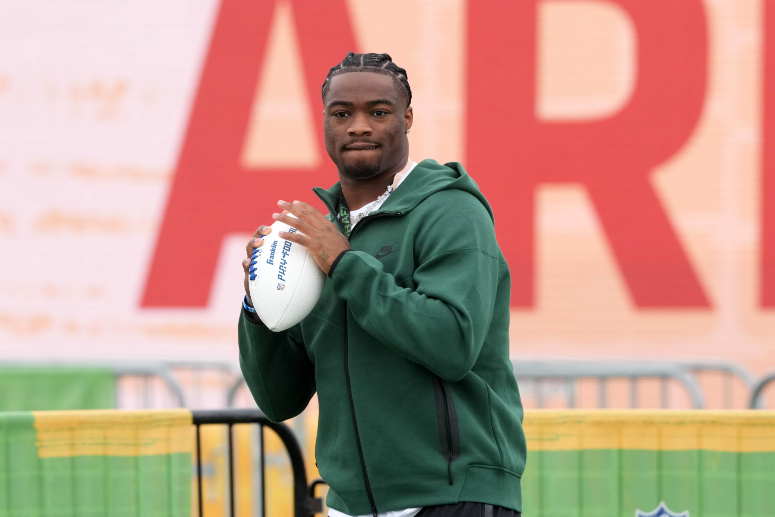Jalen Milroe, virtual reality, VR, NFL, quarterback, Seattle Seahawks, Mike Macdonald, Jayden Daniels, Washington Commanders, Kliff Kingsbury, Sam Darnold, Drew Lock, NFL Draft, quarterback training, football, NFL rookies, NFL season, football mechanics, passing efficiency, NFL power rankings

