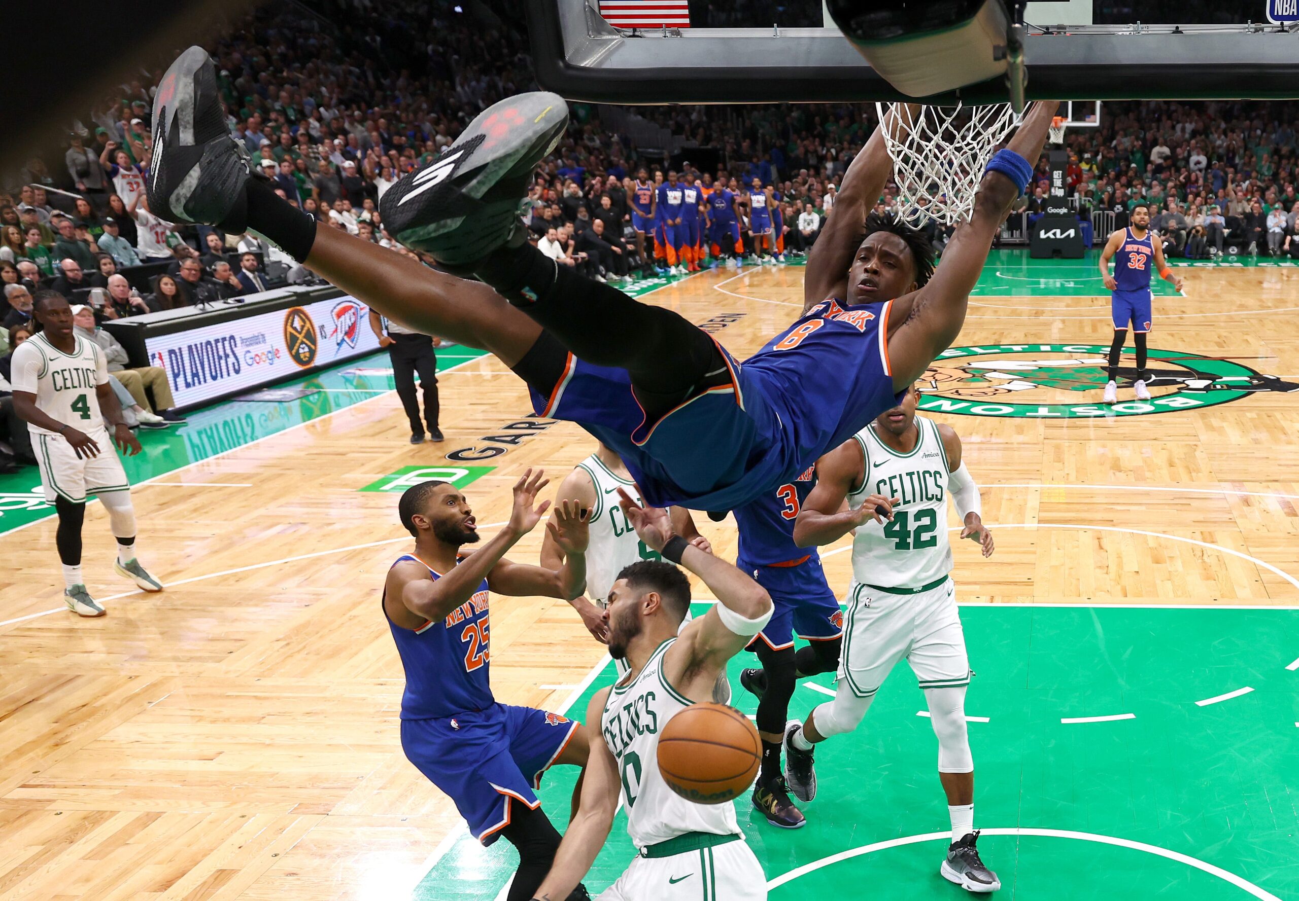 New York Knicks, Boston Celtics, NBA Playoffs, Game 1, Second Round, Comeback, Fourth Quarter, Overtime, Shooting Struggles, Rebounds, Kristaps Porzingis, TD Garden
