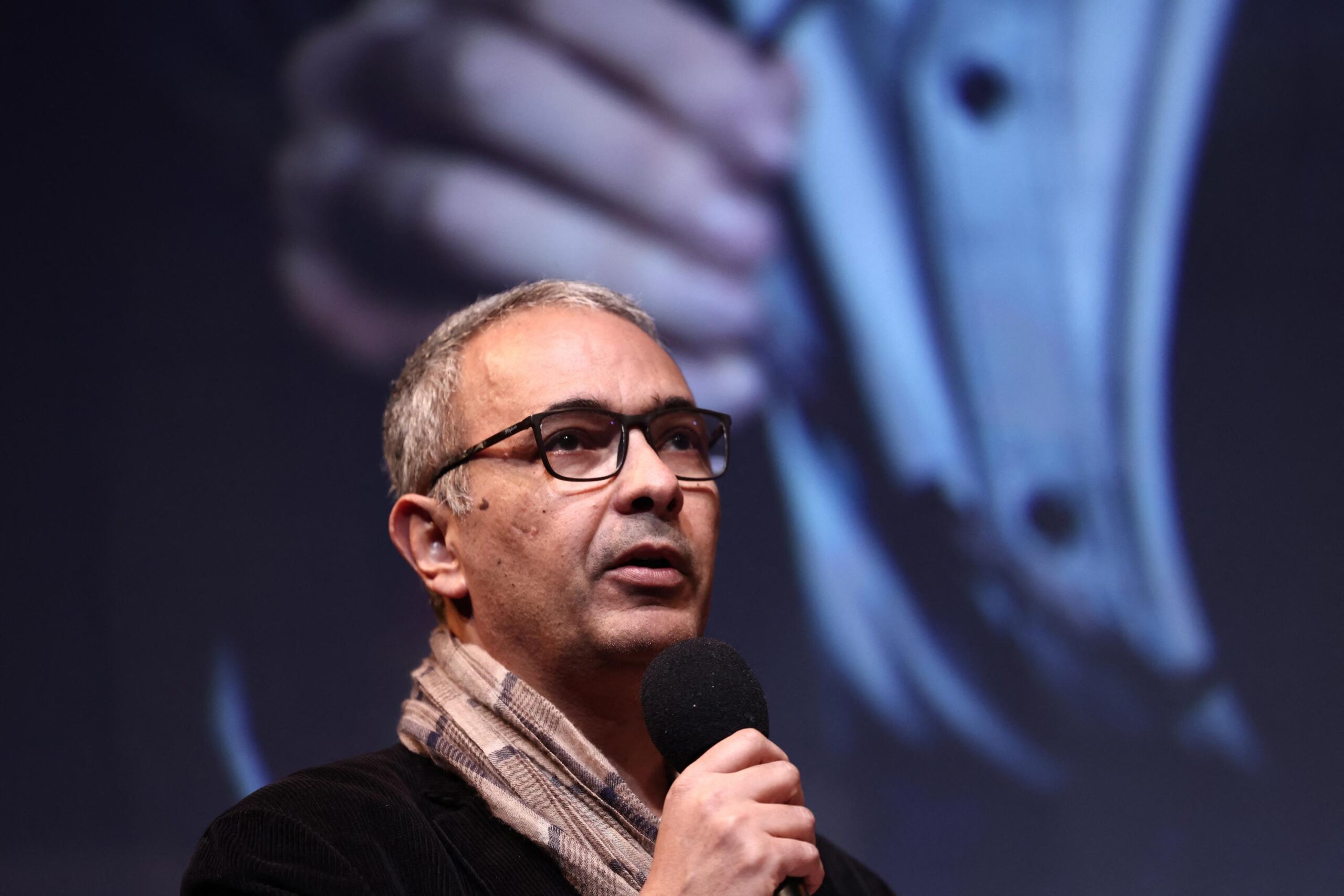 Kamel Daoud, arrest warrant, Algeria, franco-algerian writer, Houris, Goncourt Prize, political persecution, freedom of expression, censorship, national reconciliation law, Bouteflika, Oran, Interpol, Jacqueline Laffont, violation of privacy, Algerian politics
