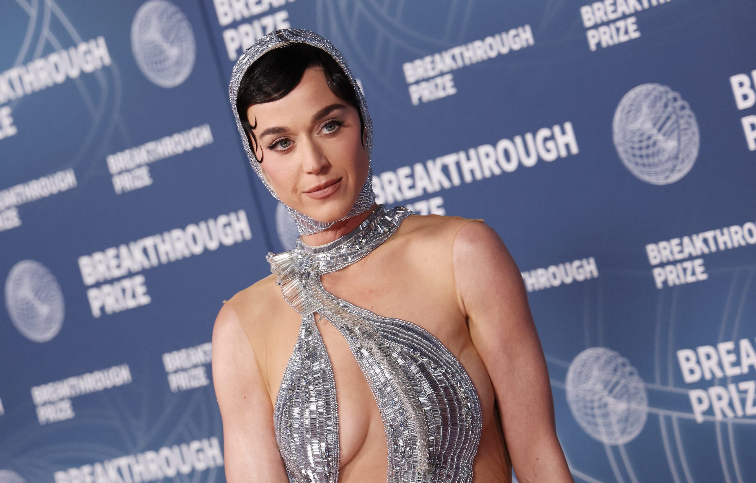 Katy Perry, Meghan Markle, celebrity backlash, online hate, cyberbullying, mental health, fame, wealth disparity, Blue Origin, space flight, internet outrage, pop culture, celebrity criticism, overexposure, public image, celebrity therapist, coping mechanisms, social media, Stephanie Sarkis, Rob Shuter, 